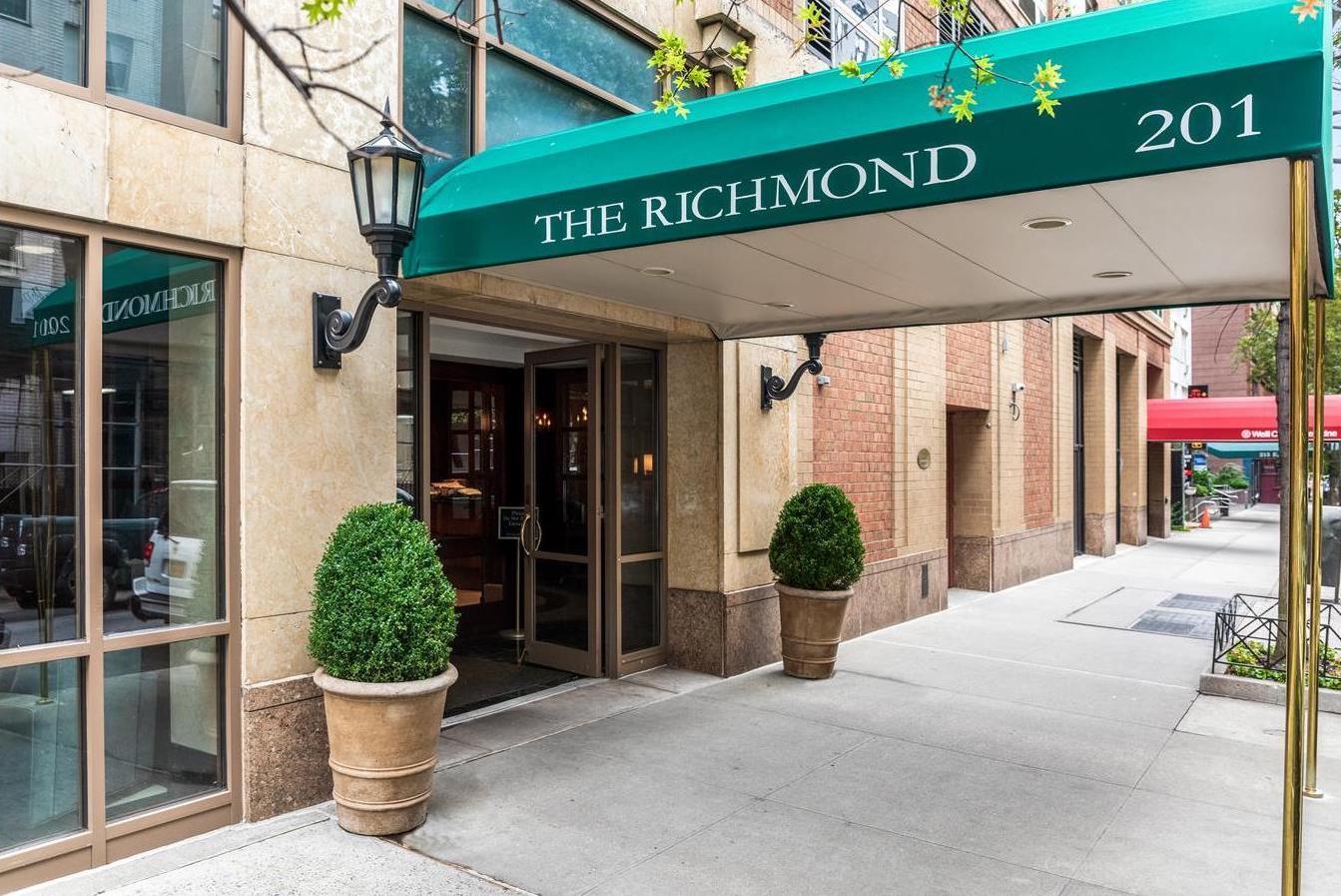 201 East 80th Street, Unit 16D Manhattan, NY 10075 - Photo 18 of 19 a view of a street with potted plants