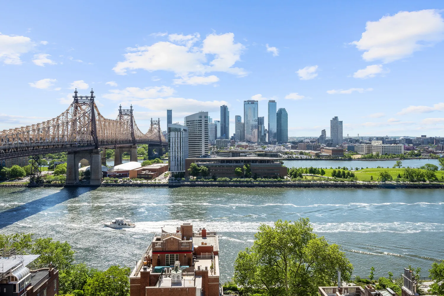 a view of a lake with a city