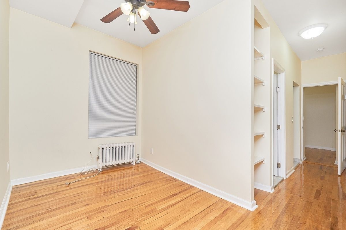 270 East 78th Street, Unit 12 Manhattan, NY 10075 - Photo 2 of 6 a view of an empty room with wooden floor