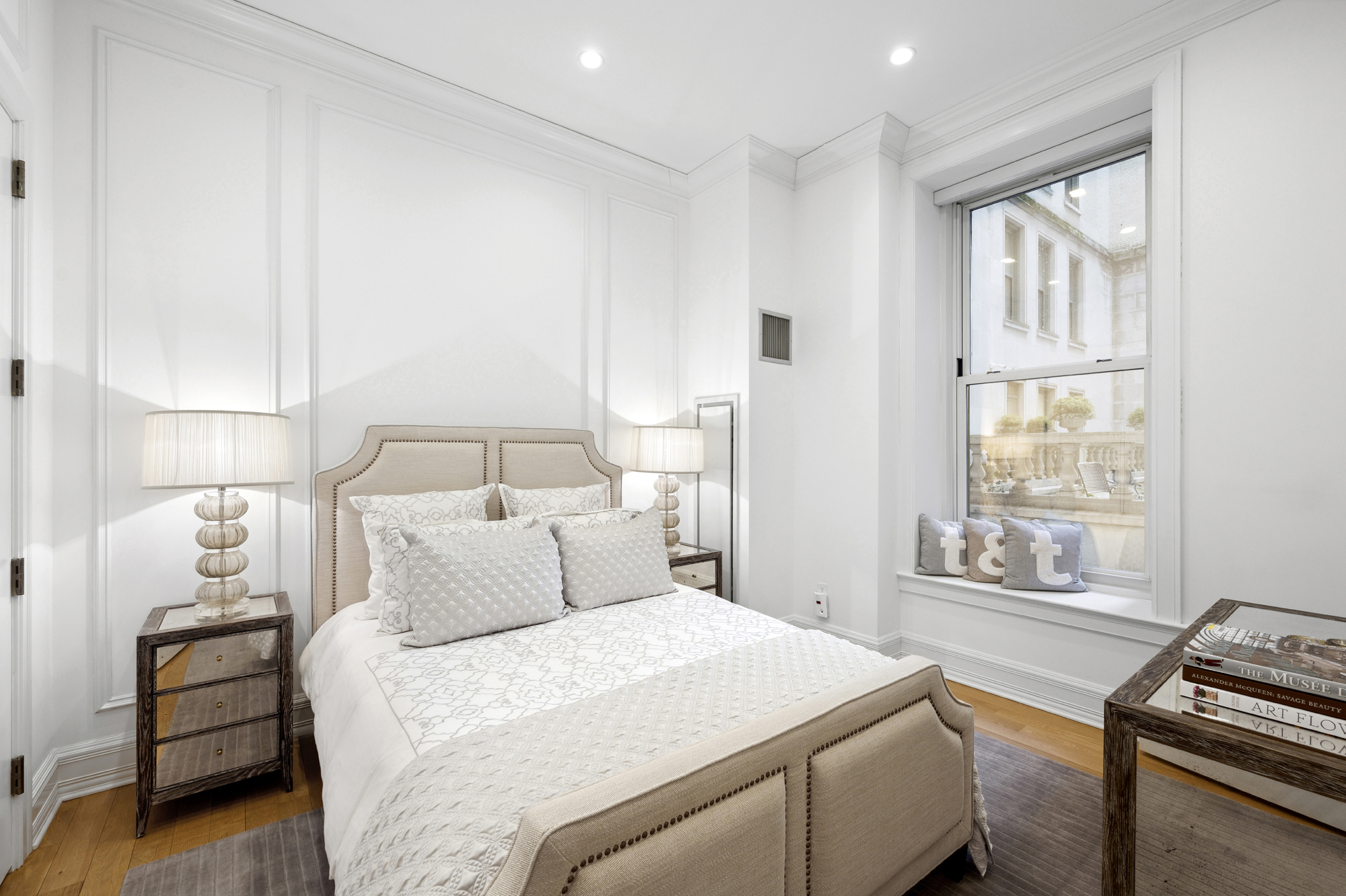 1 Central Park South, Unit 510 Manhattan, NY 10019 - Photo 14 of 23 a bedroom with a bed and a window