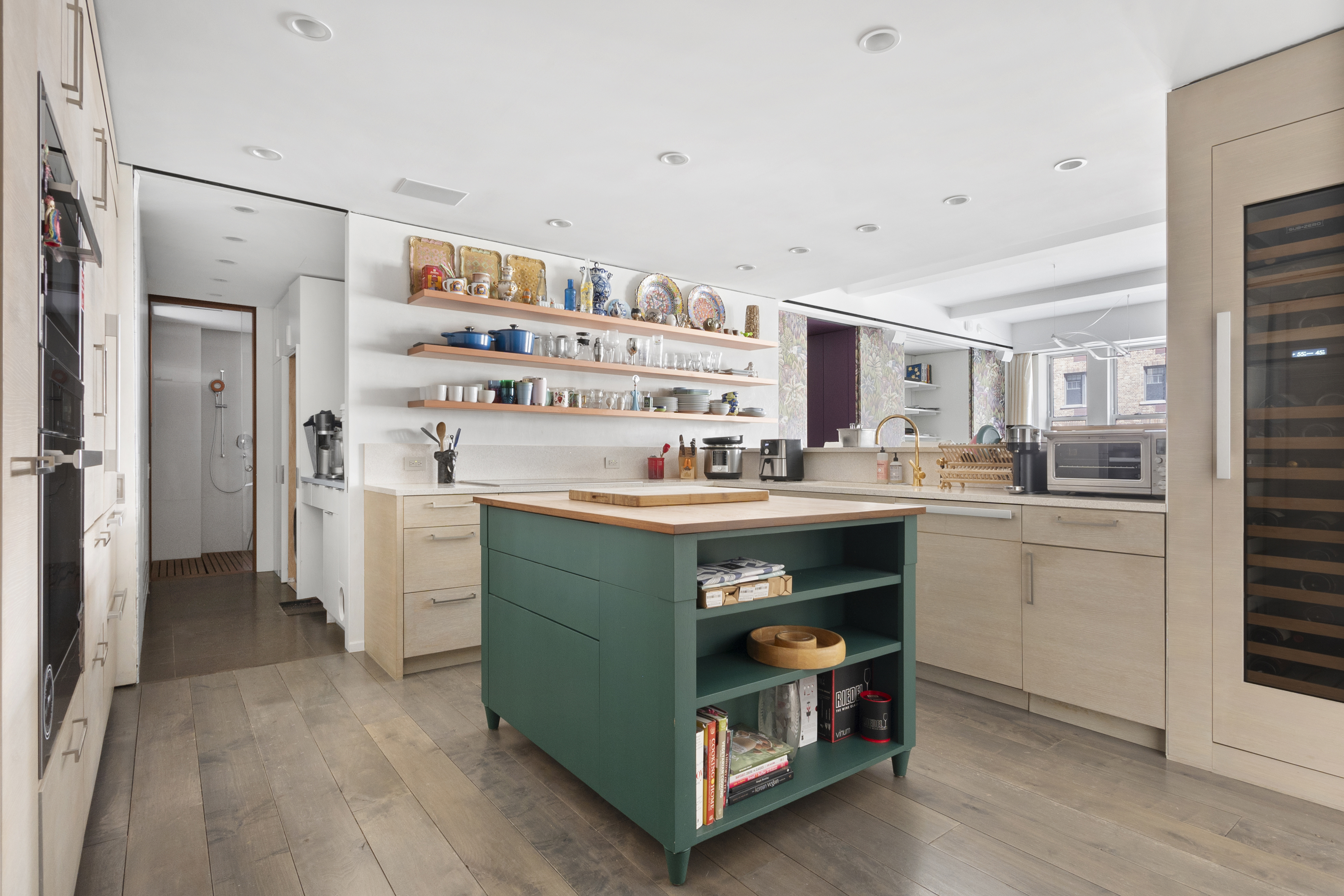 20 West 72nd Street, Unit 500 Manhattan, NY 10023 - Photo 3 of 12 a kitchen with stainless steel appliances a stove and a refrigerator