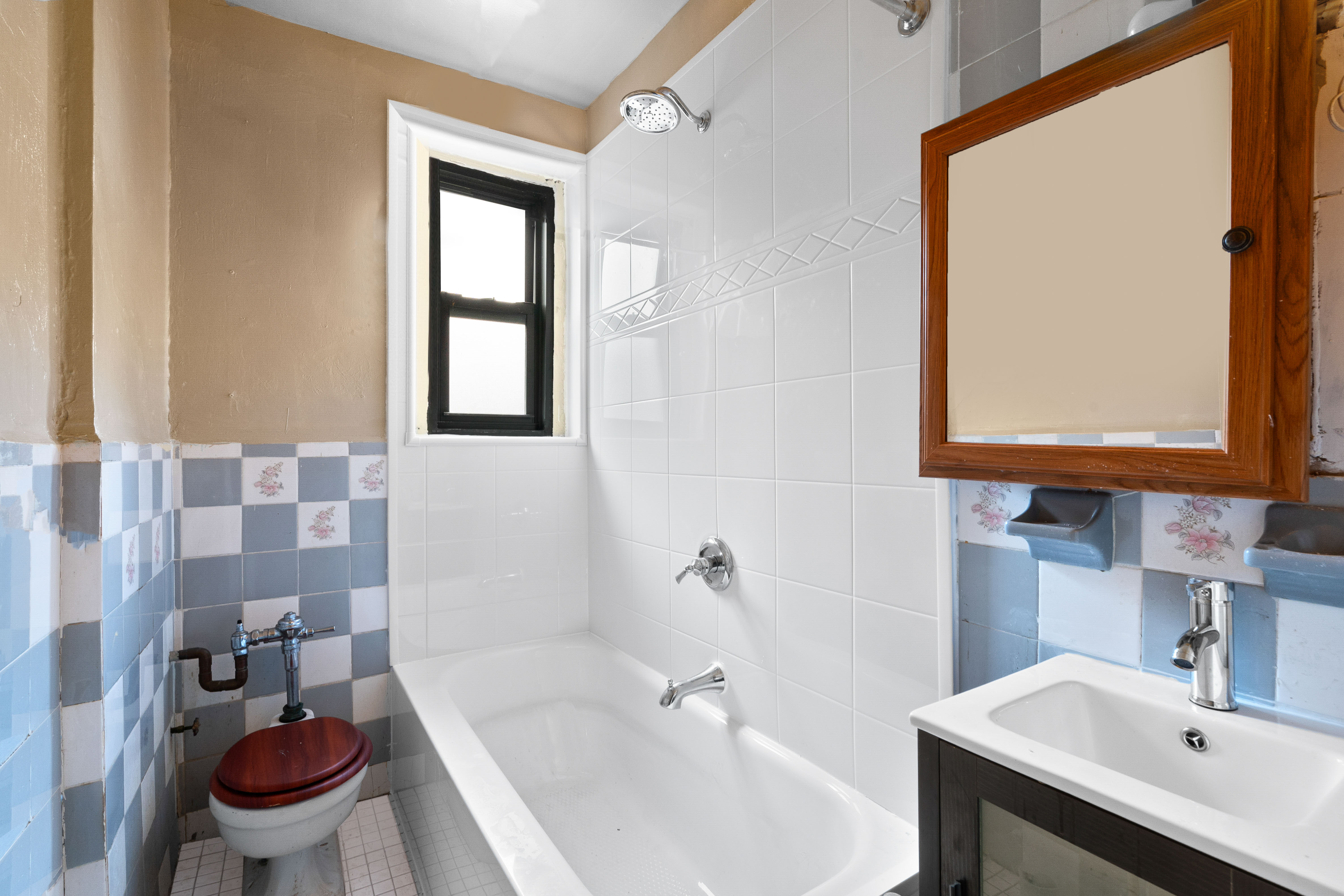 345 Montgomery Street, Unit 3C Brooklyn, NY 11225 - Photo 13 of 17 a bathroom with a sink toilet and shower