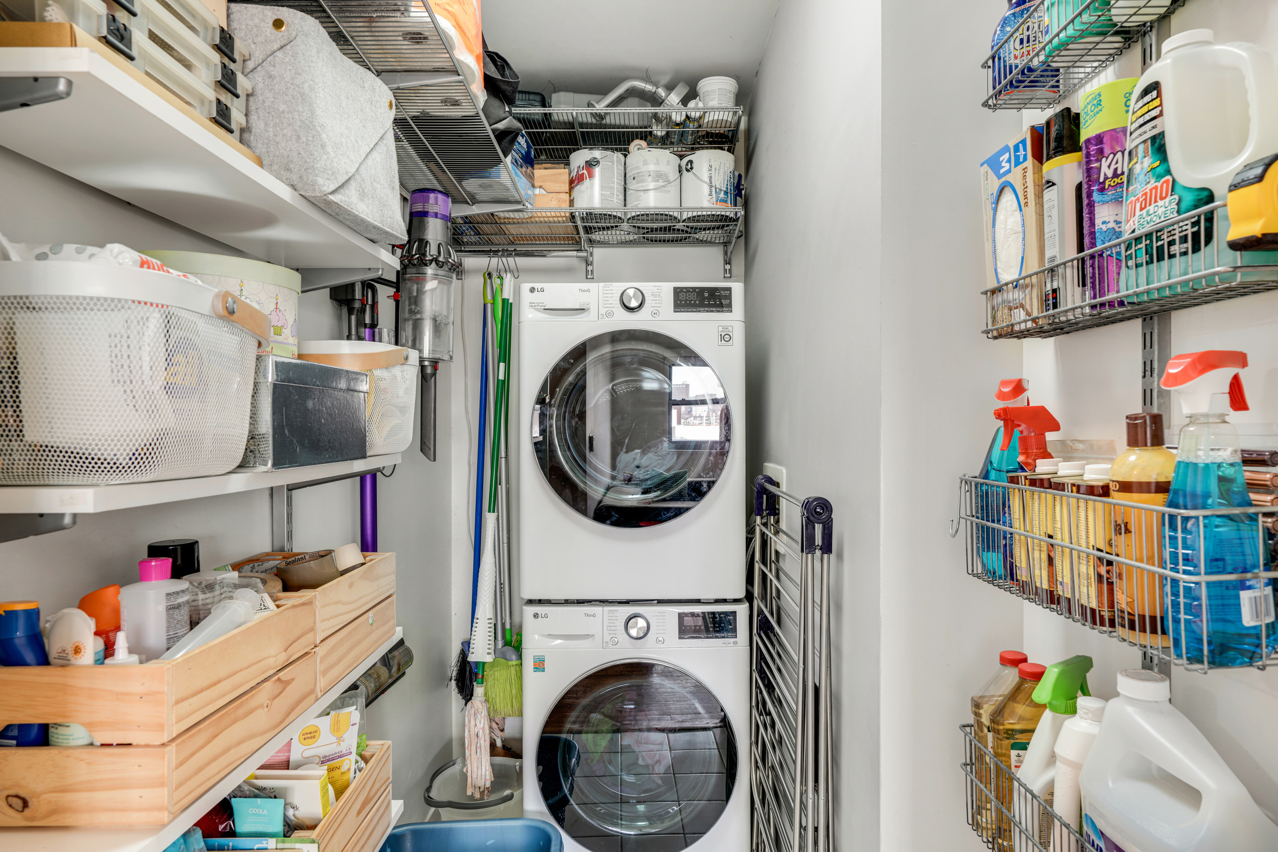 1820 Madison Avenue, Unit 7C Manhattan, NY 10035 - Photo 14 of 17 a utility room with dryer and washer