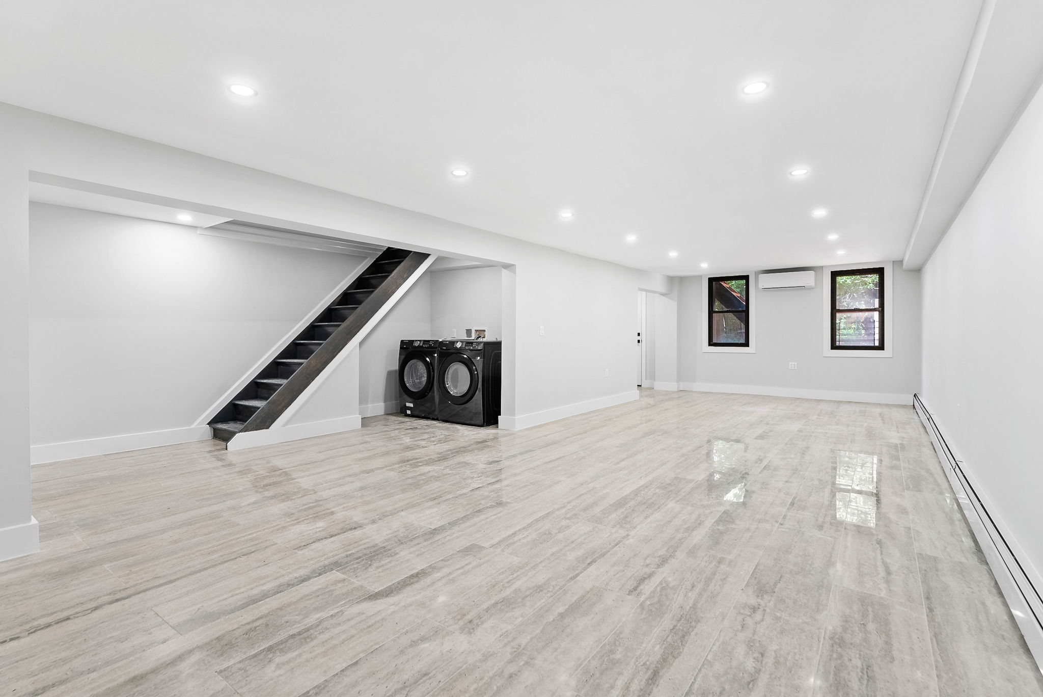 1414 30th Road Queens, NY 11102 - Photo 10 of 16 a view of an empty room with wooden floor