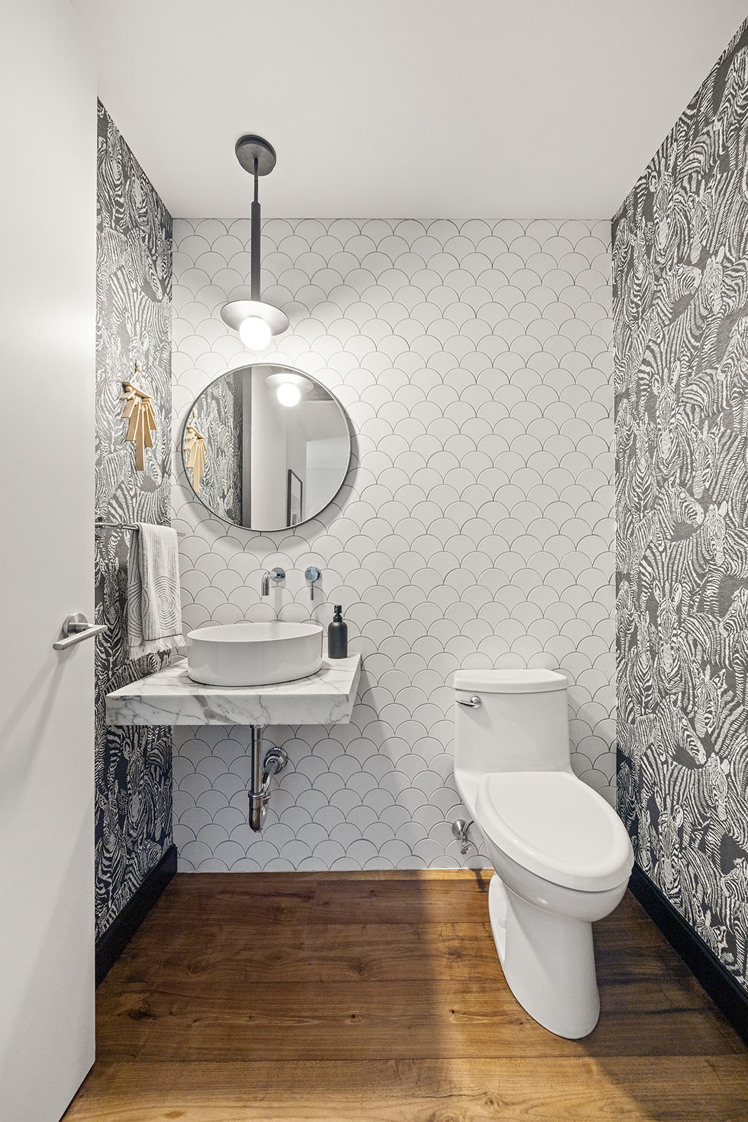 305 23rd Street, Unit 3W Brooklyn, NY 11215 - Photo 14 of 21 a bathroom with a sink a toilet and a mirror