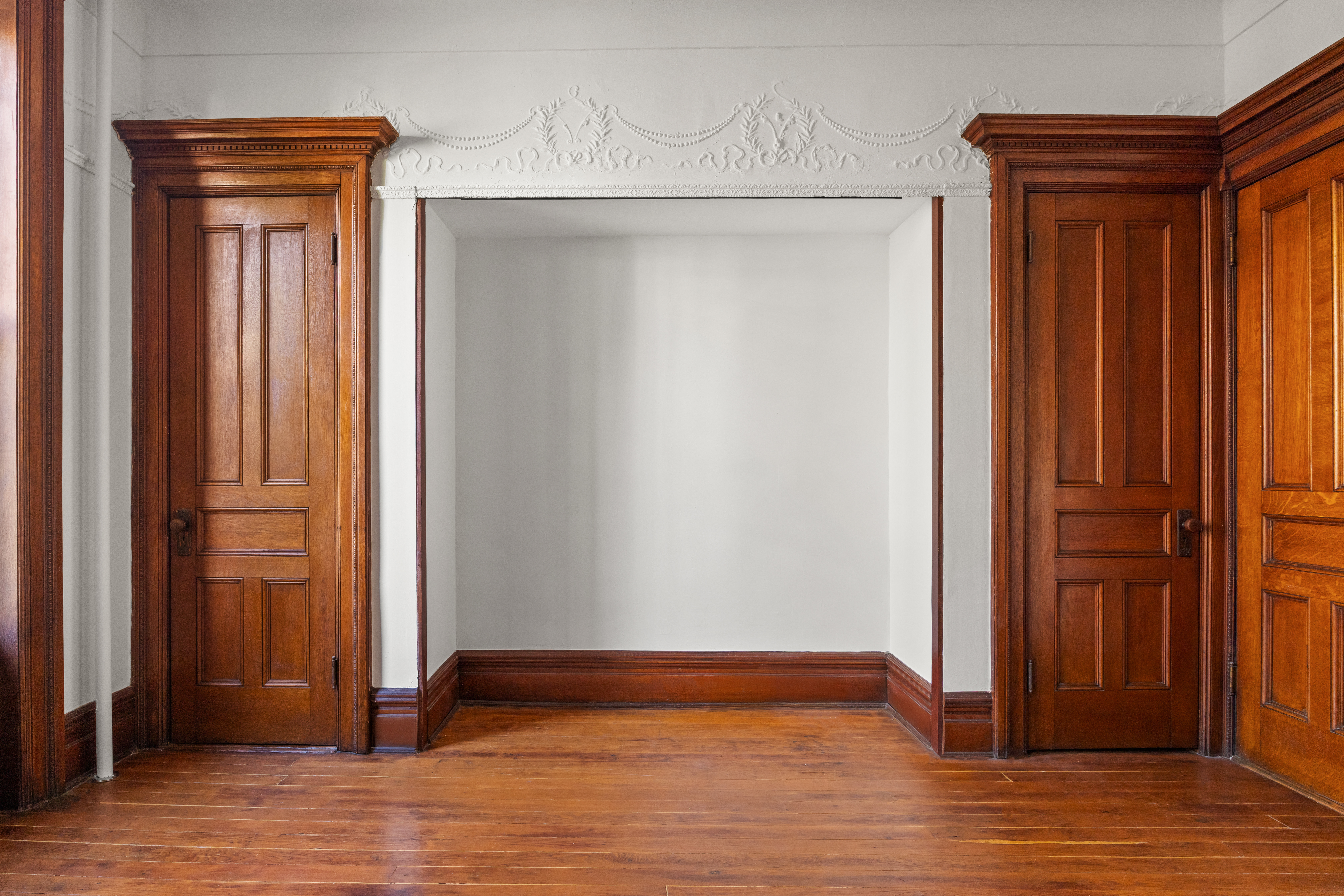 415 5th Street, Unit 1 Brooklyn, NY 11215 - Photo 4 of 14 an empty room with wooden floor and closet