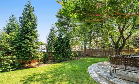 a view of a yard with an trees