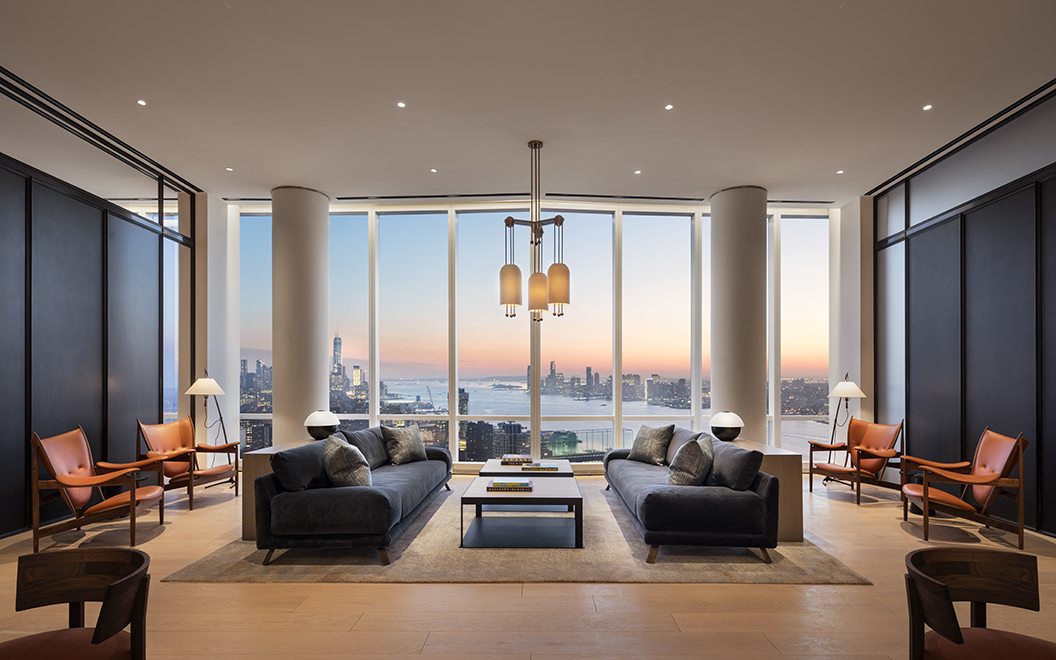 15 Hudson Yards, Unit 77B Manhattan, NY 10001 - Photo 12 of 24 a living room with furniture and large windows