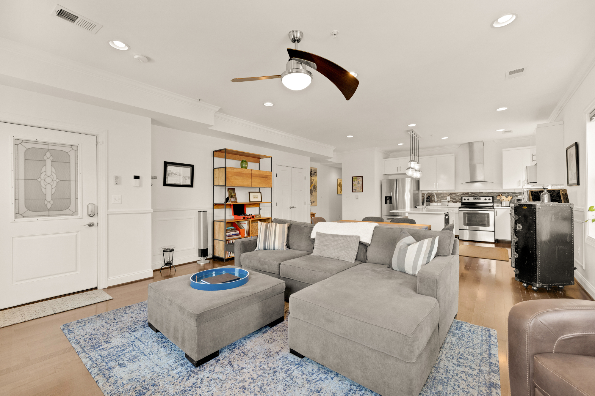 233 S Street Northeast, Unit 4 Washington, DC 20002 - Photo 6 of 37 a living room with furniture and kitchen view
