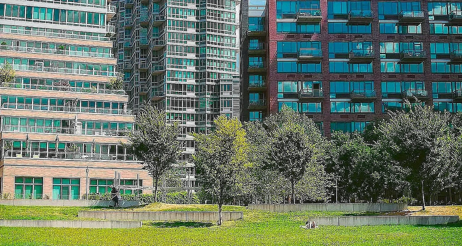 26-14 Jackson Avenue, Unit 9BB Queens, NY 11101 - Photo 7 of 8 a view of a large building with a swimming pool