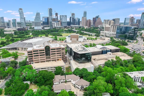a view of a city with tall buildings
