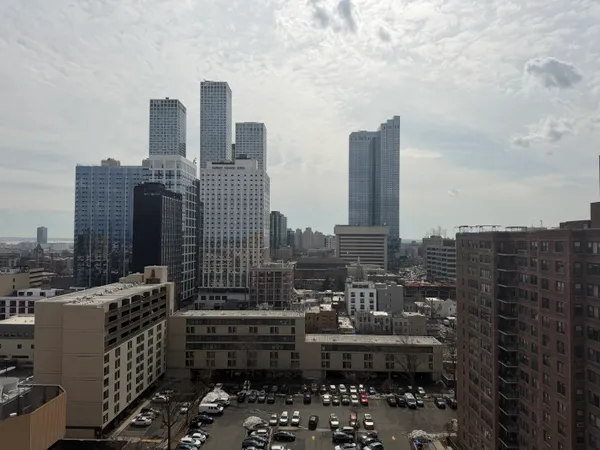 a view of a city with tall buildings