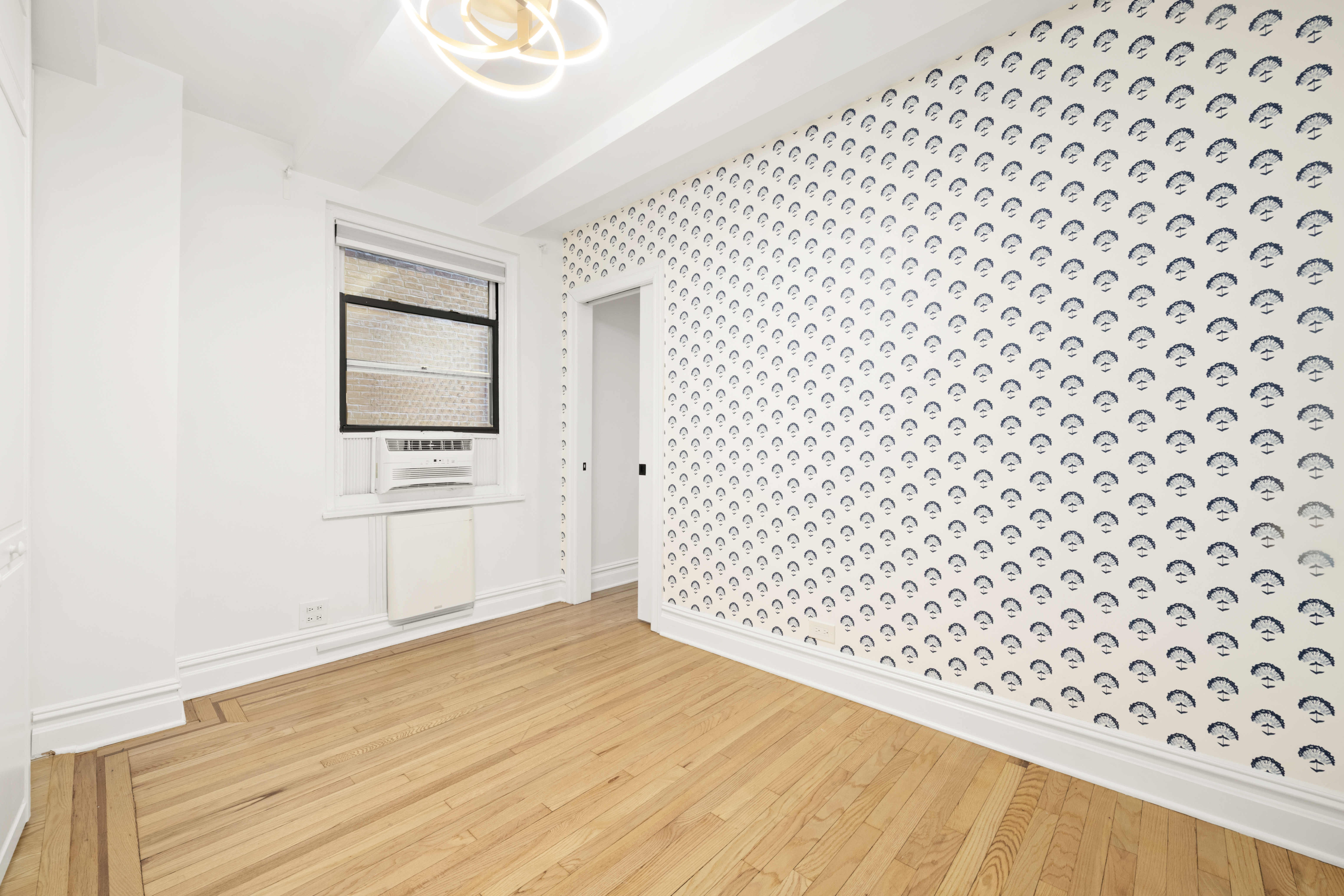 152 East 94th Street, Unit 2J Manhattan, NY 10128 - Photo 14 of 18 a view of a black gate