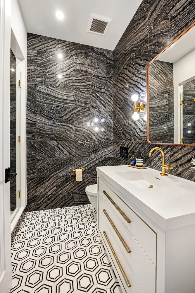 a bathroom with a sink and a shower