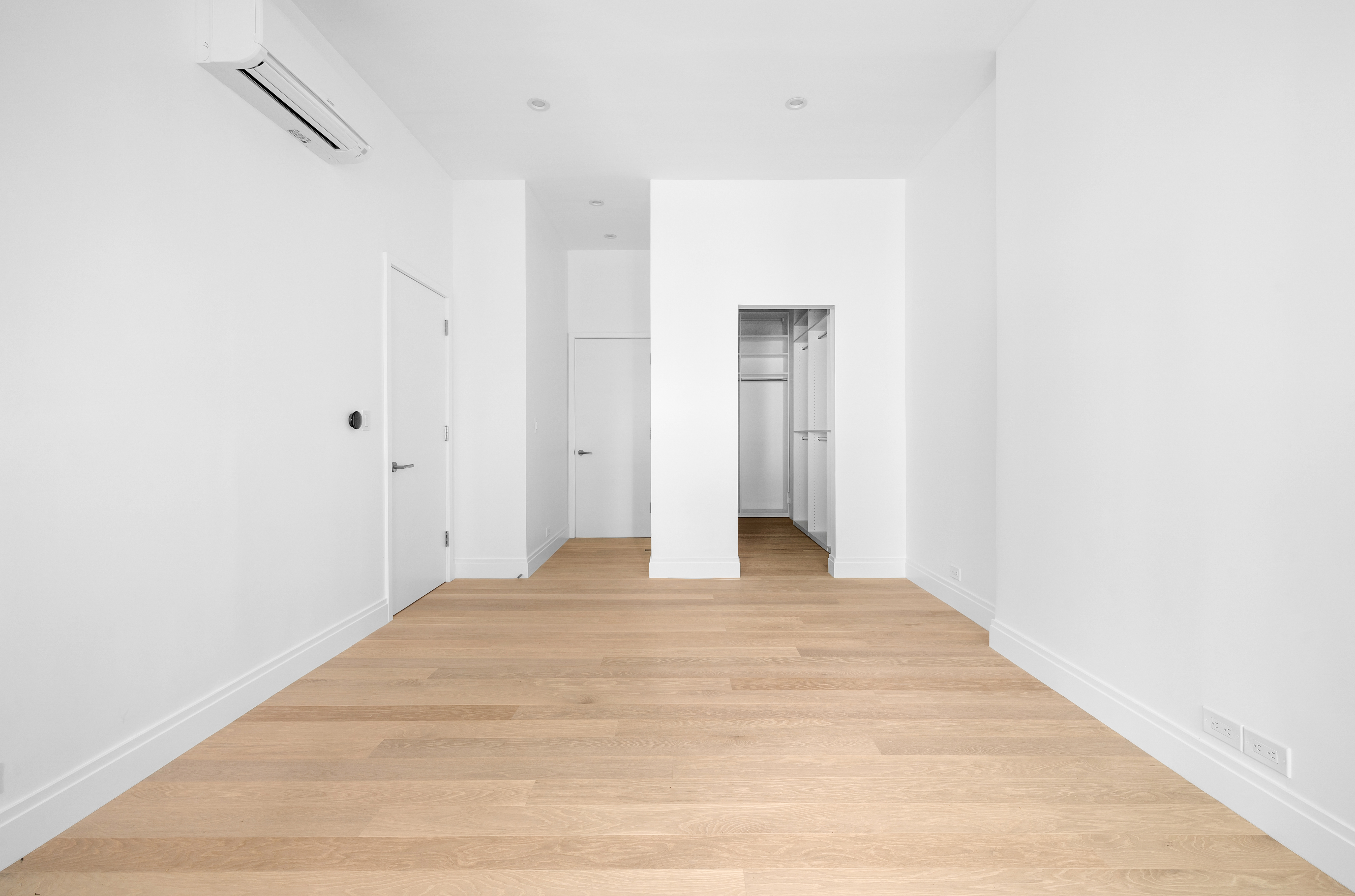 69 Bank Street, Unit 203 Manhattan, NY 10014 - Photo 14 of 23 a view of a room with wooden floor