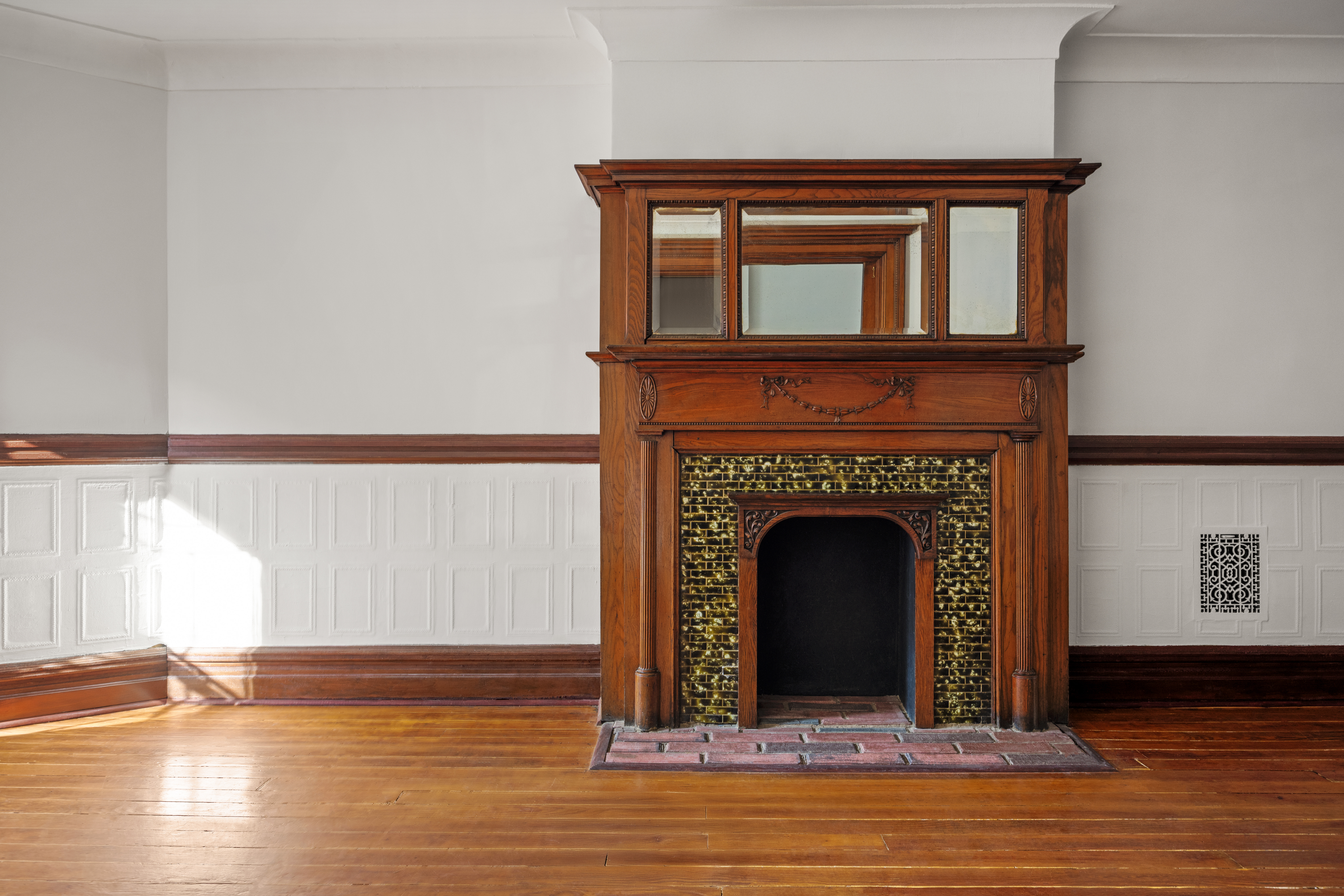 415 5th Street, Unit 1 Brooklyn, NY 11215 - Photo 8 of 14 a living room with a fireplace and wooden floor