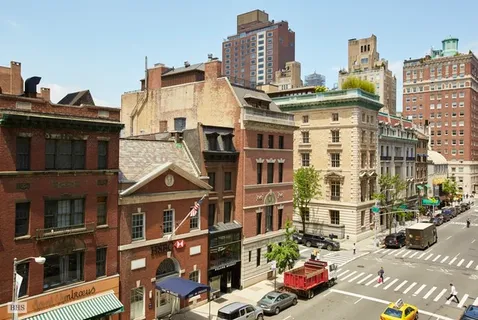 a view of a street in front of building