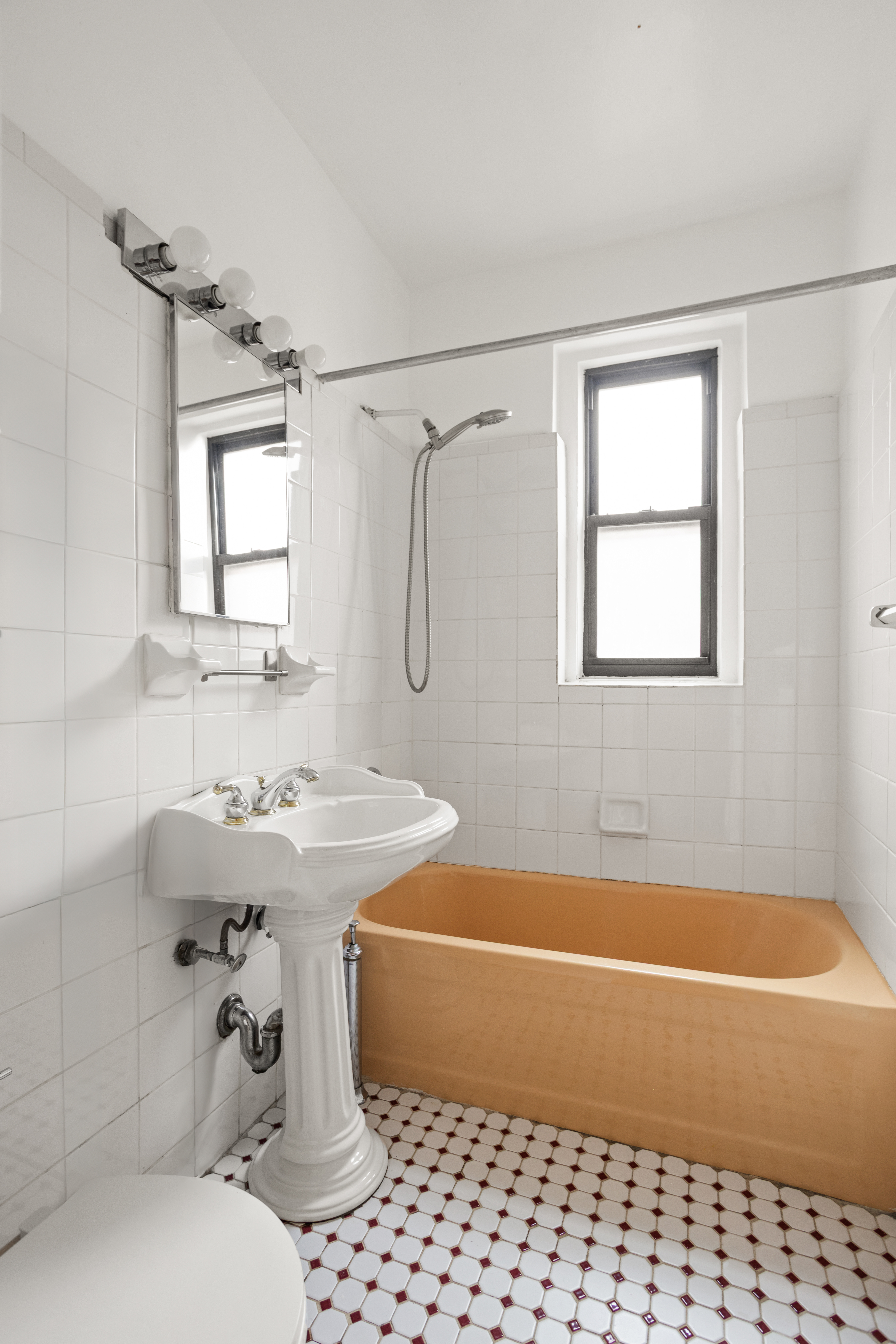 35-30 73rd Street Queens, NY 11372 - Photo 6 of 11 a bathroom with a sink toilet and shower