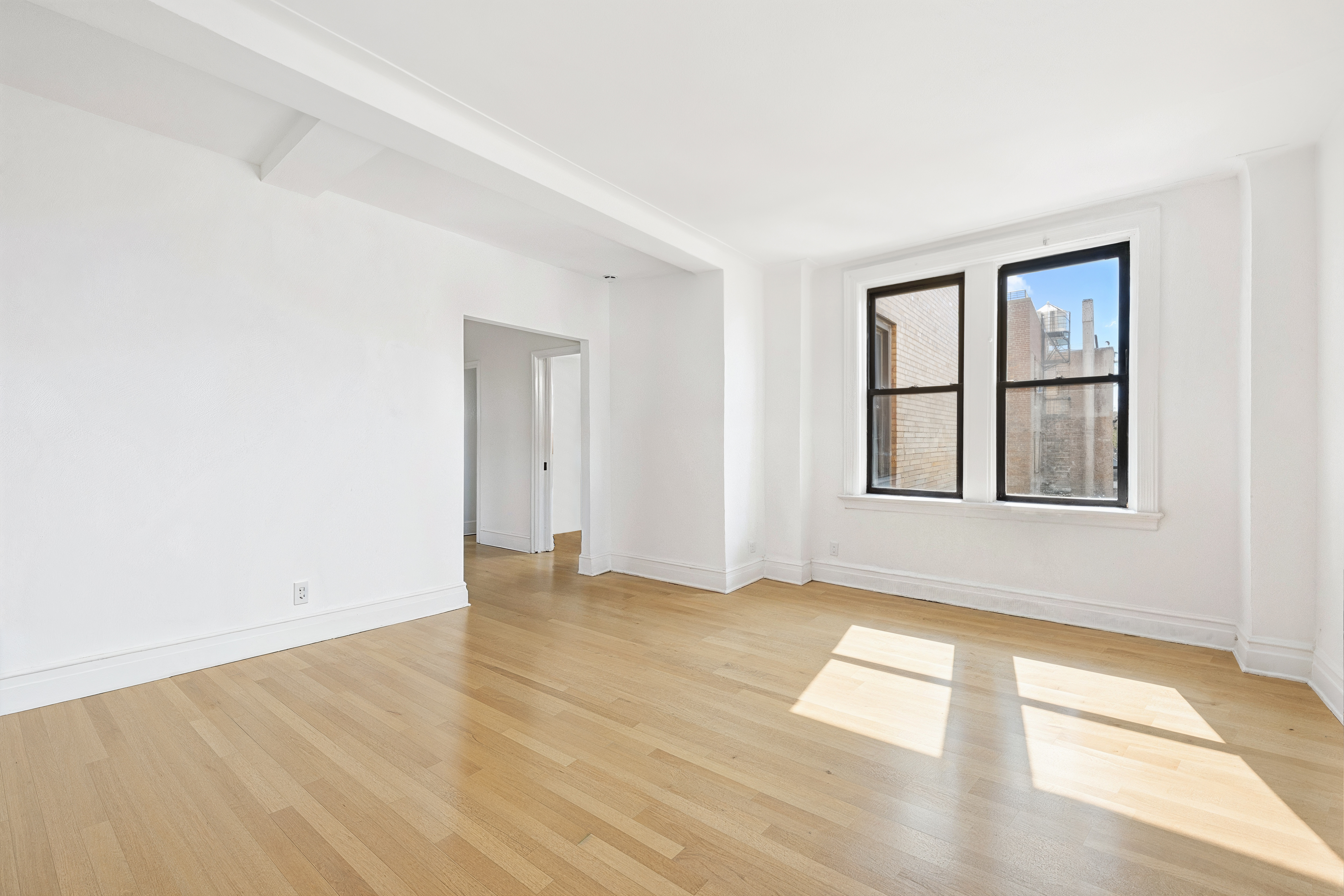 473 West End Avenue, Unit 13D Manhattan, NY 10024 - Photo 6 of 13 an empty room with windows
