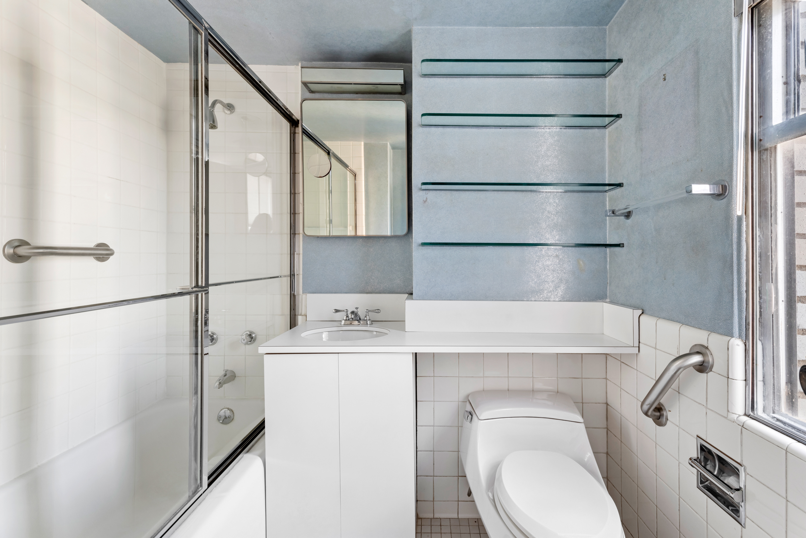 35 Sutton Place, Unit PHB Manhattan, NY 10022 - Photo 7 of 14 a bathroom with a sink toilet and shower