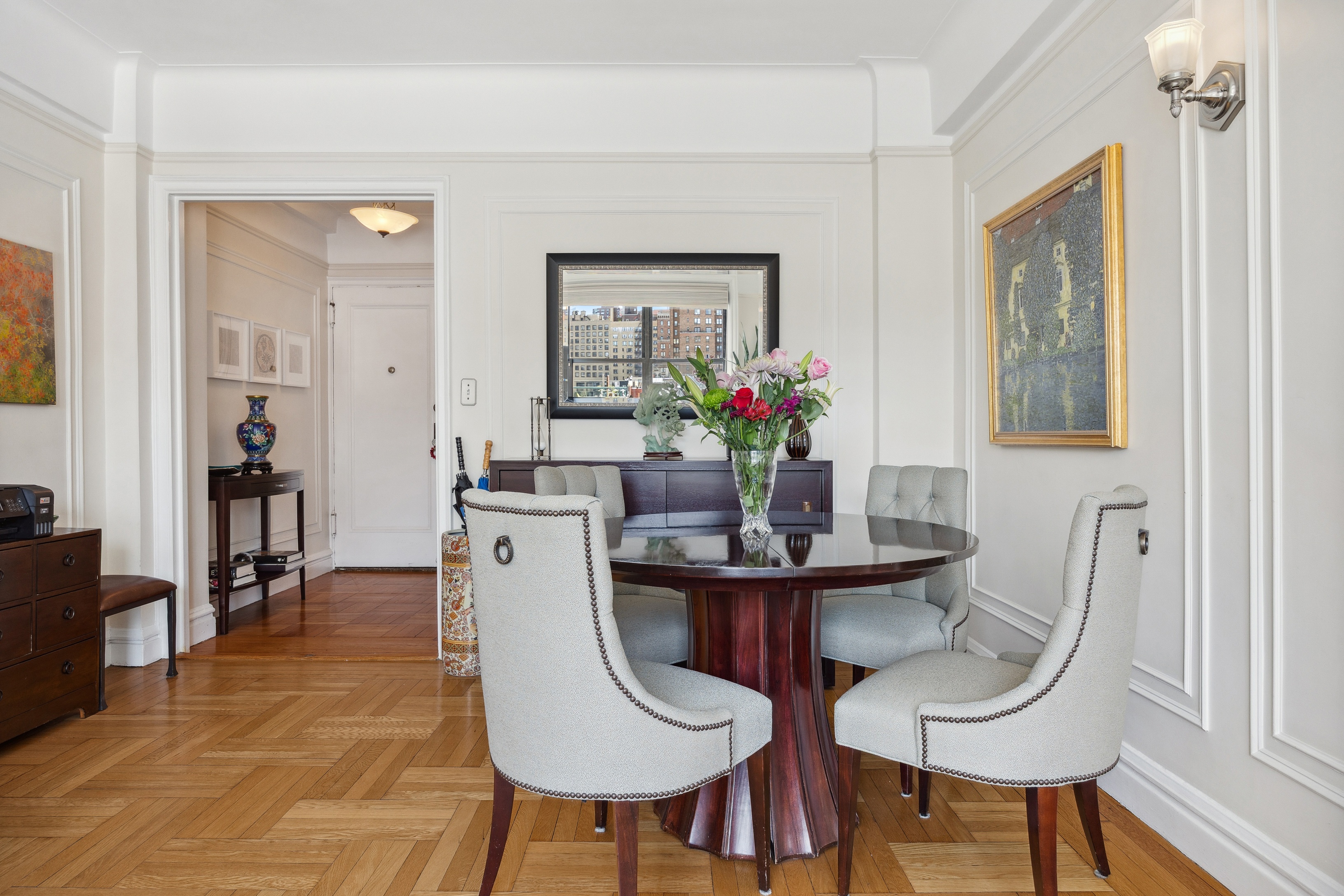 40 West 77th Street, Unit 8C Manhattan, NY 10024 - Photo 4 of 21 a dining room with furniture and window