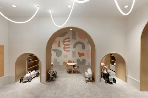 a room with a mirror and a fan