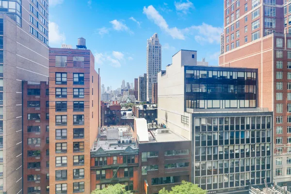 a view of a terrace with sitting chairs