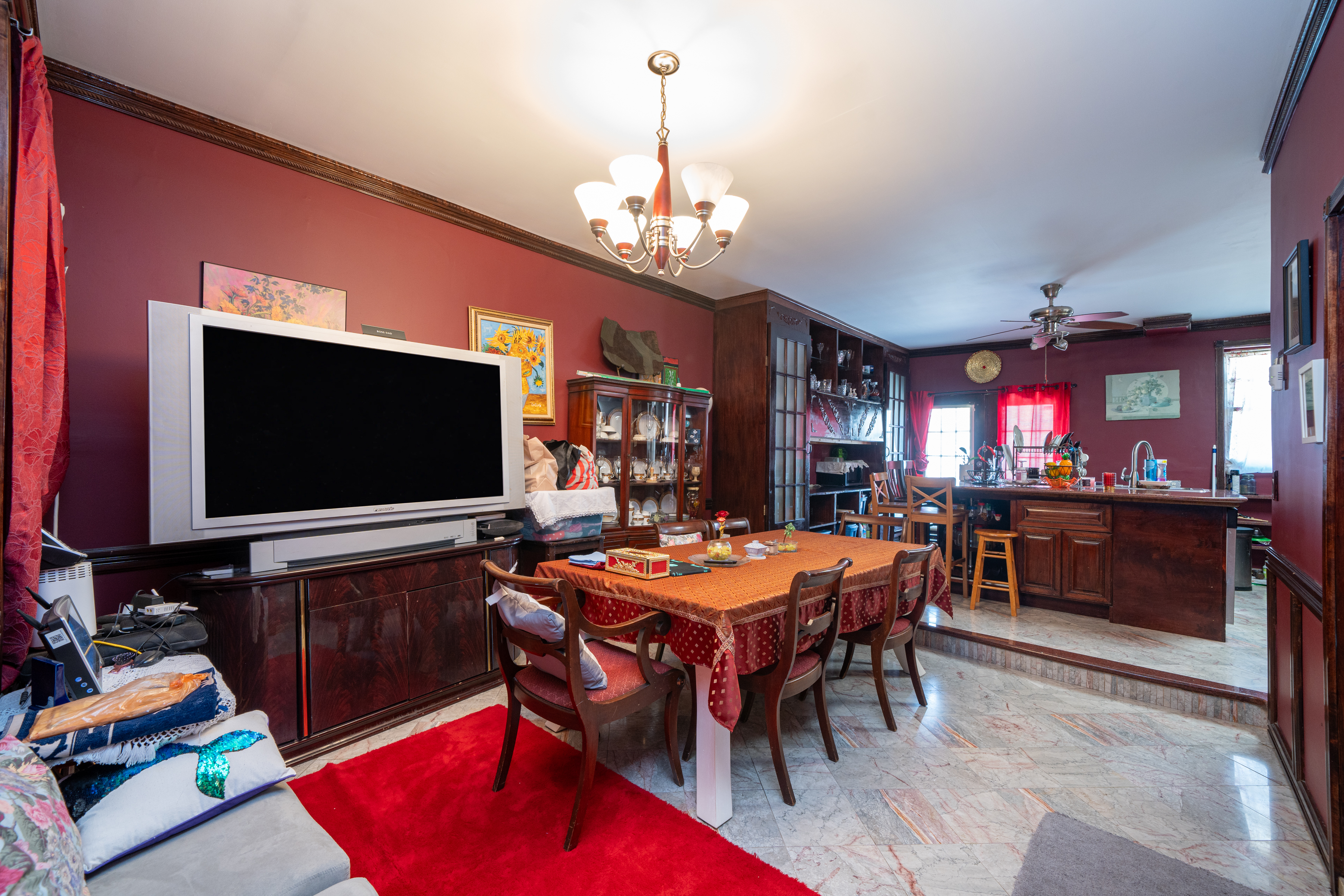 415 84th Street Brooklyn, NY 11209 - Photo 5 of 17 a outdoor dining space with furniture and a chandelier