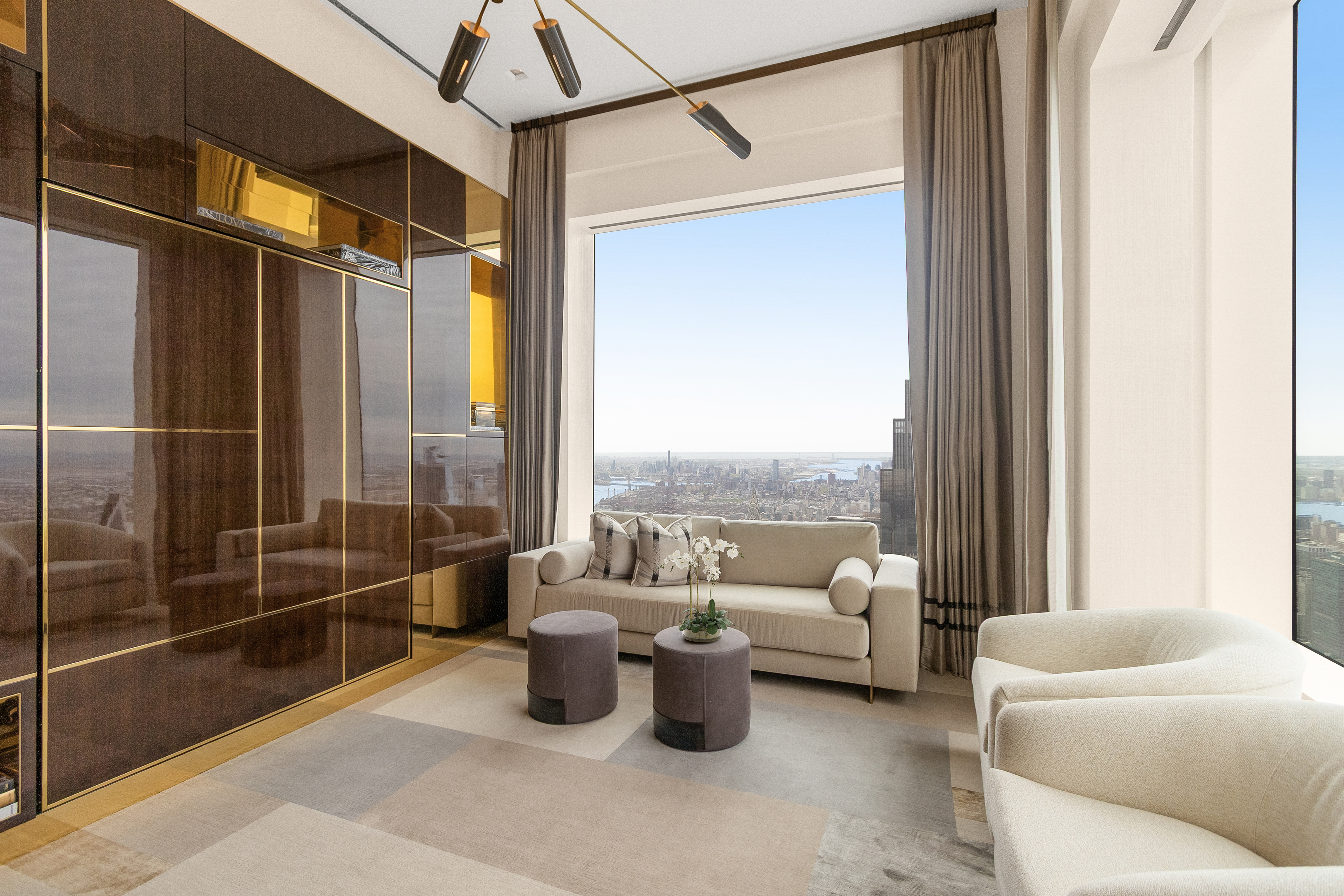 432 Park Avenue, Unit PH88 Manhattan, NY 10022 - Photo 11 of 17 a living room with furniture and a floor to ceiling window