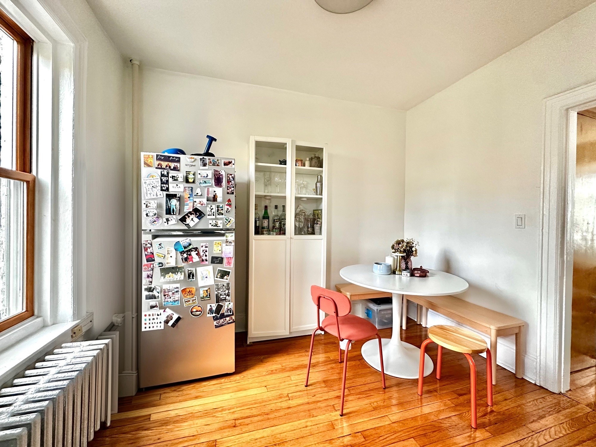 85 Bergen Street, Unit 2C Brooklyn, NY 11201 - Photo 2 of 6 a view of a dining room with furniture window and wooden floor