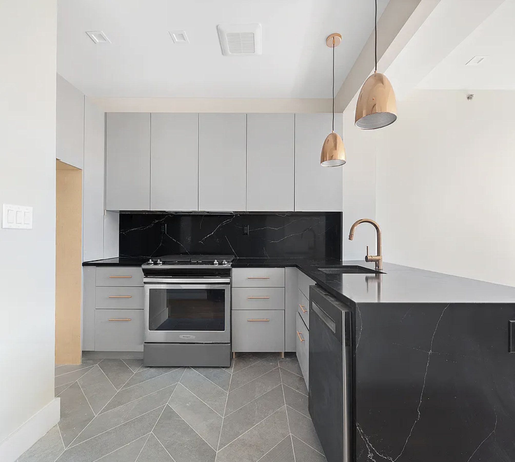 371 Lincoln Road, Unit 2 Brooklyn, NY 11225 - Photo 5 of 19 a kitchen with a sink and a stove