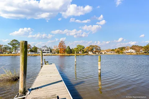 a view of a lake with houses