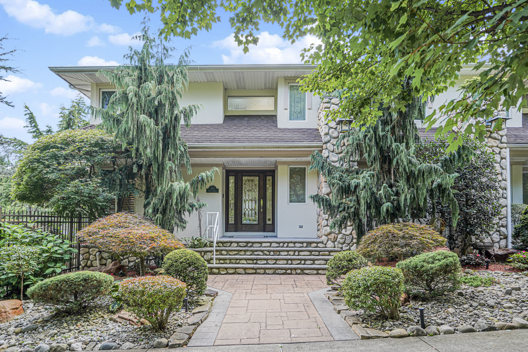 165 Swaim Avenue Staten Island, NY 10312 - Photo 1 of 45 a front view of a house with garden