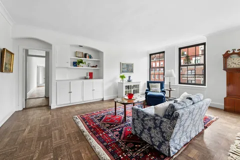 a living room with furniture and a couch