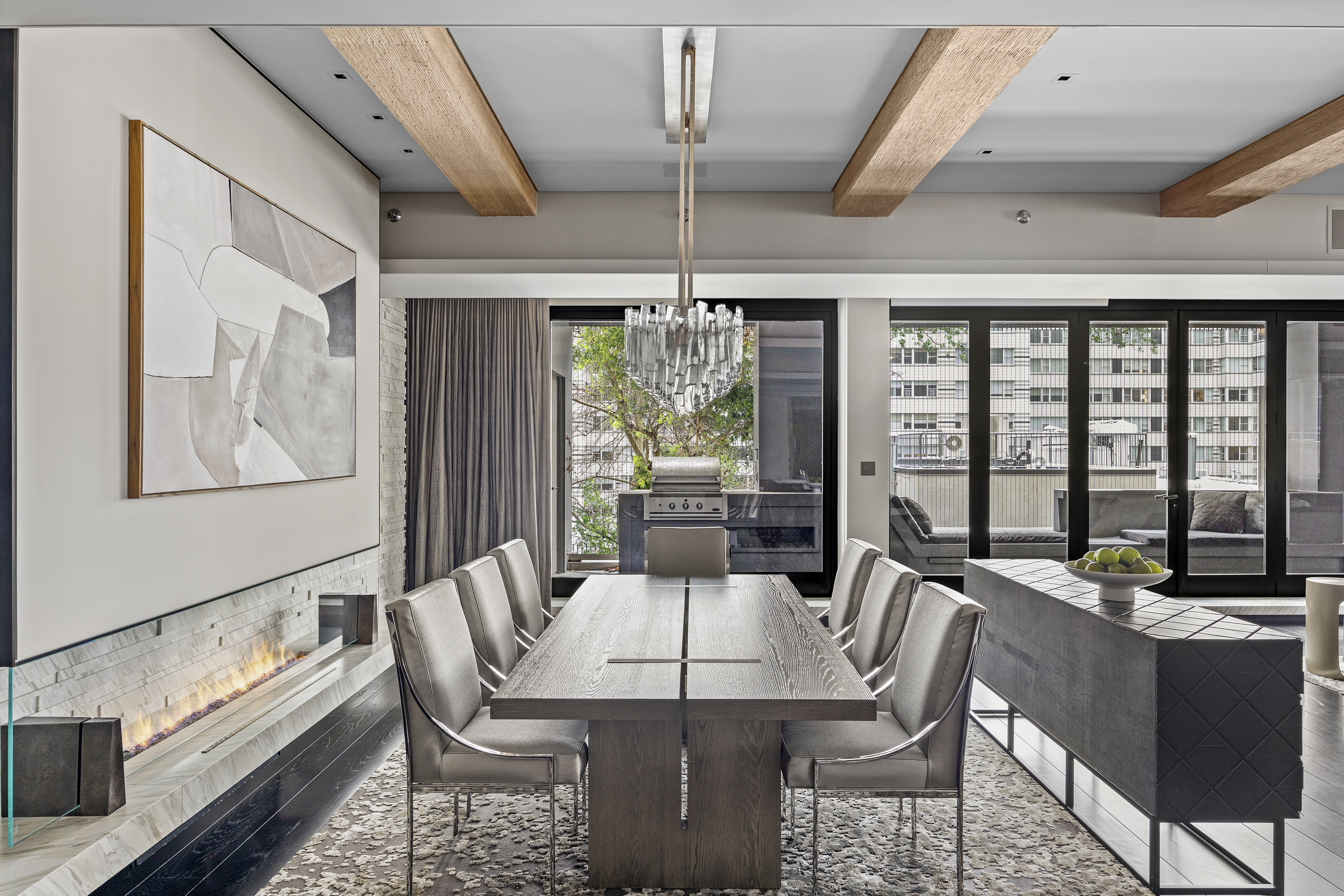 219 East 67th Street, Unit 5 Manhattan, NY 10065 - Photo 4 of 18 a view of a dining room with furniture large windows and wooden floor