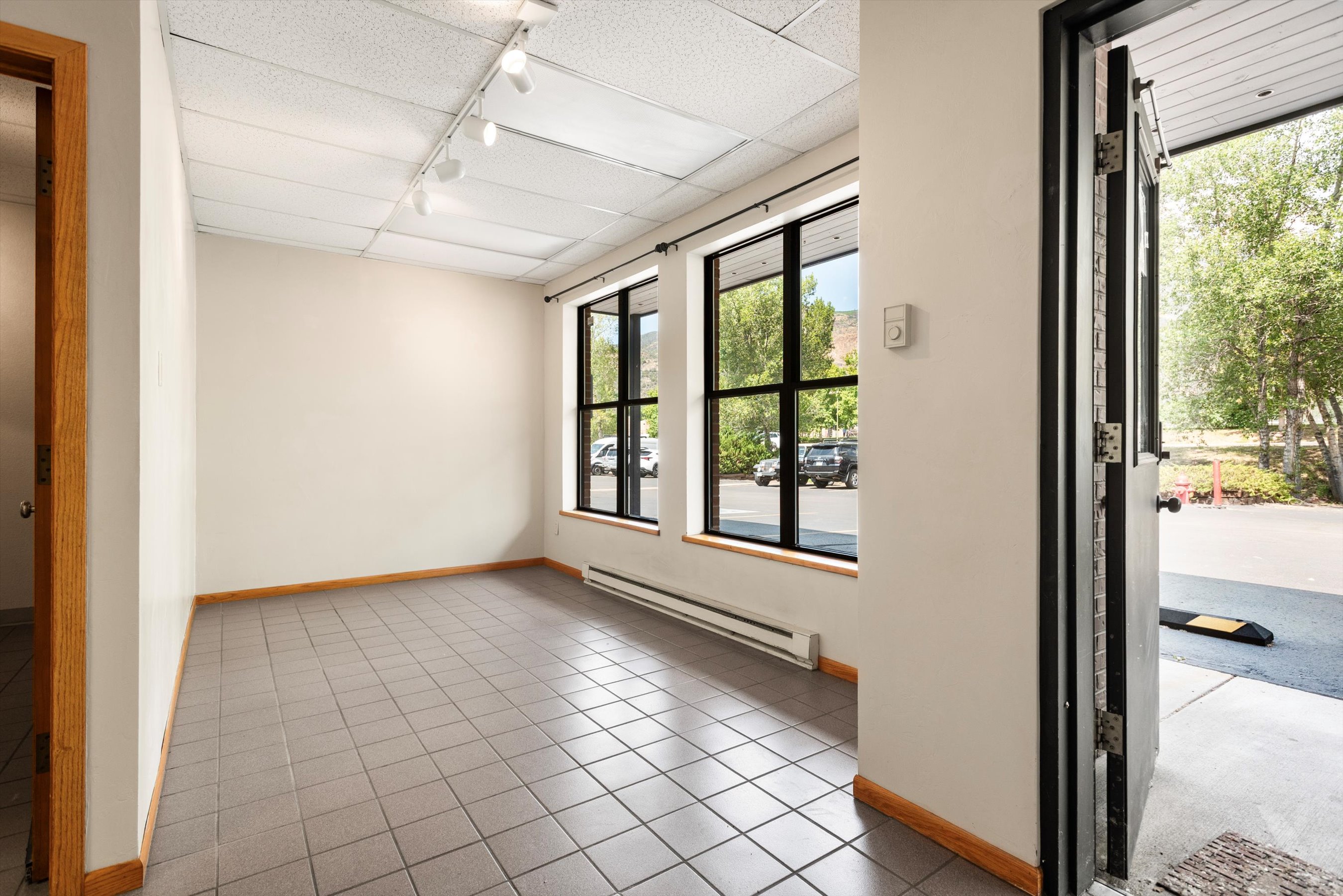 23286 Two Rivers Road, Unit 23 Basalt, CO 81621 - Photo 5 of 14 a view of an empty room with a window