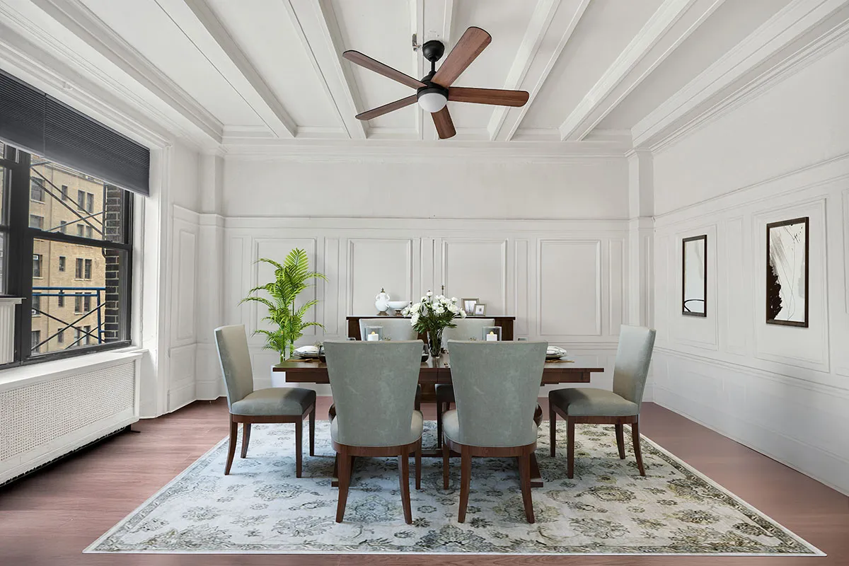 a view of a dining room with furniture and window