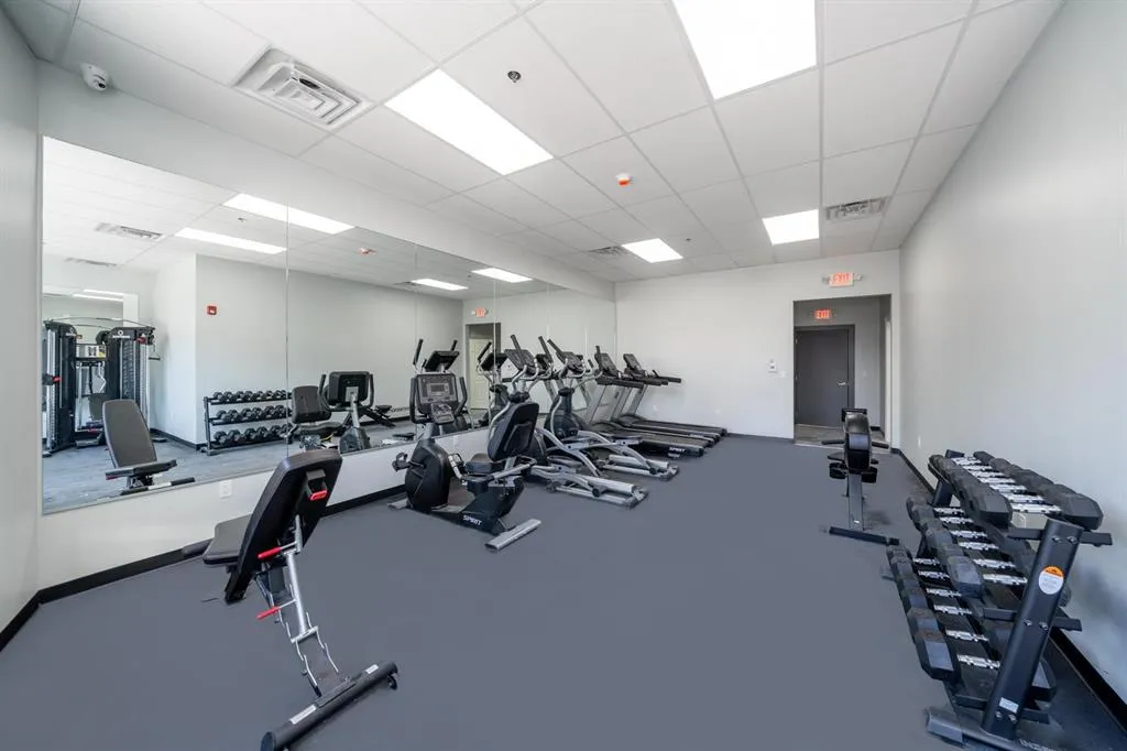 a view of a room with gym equipment