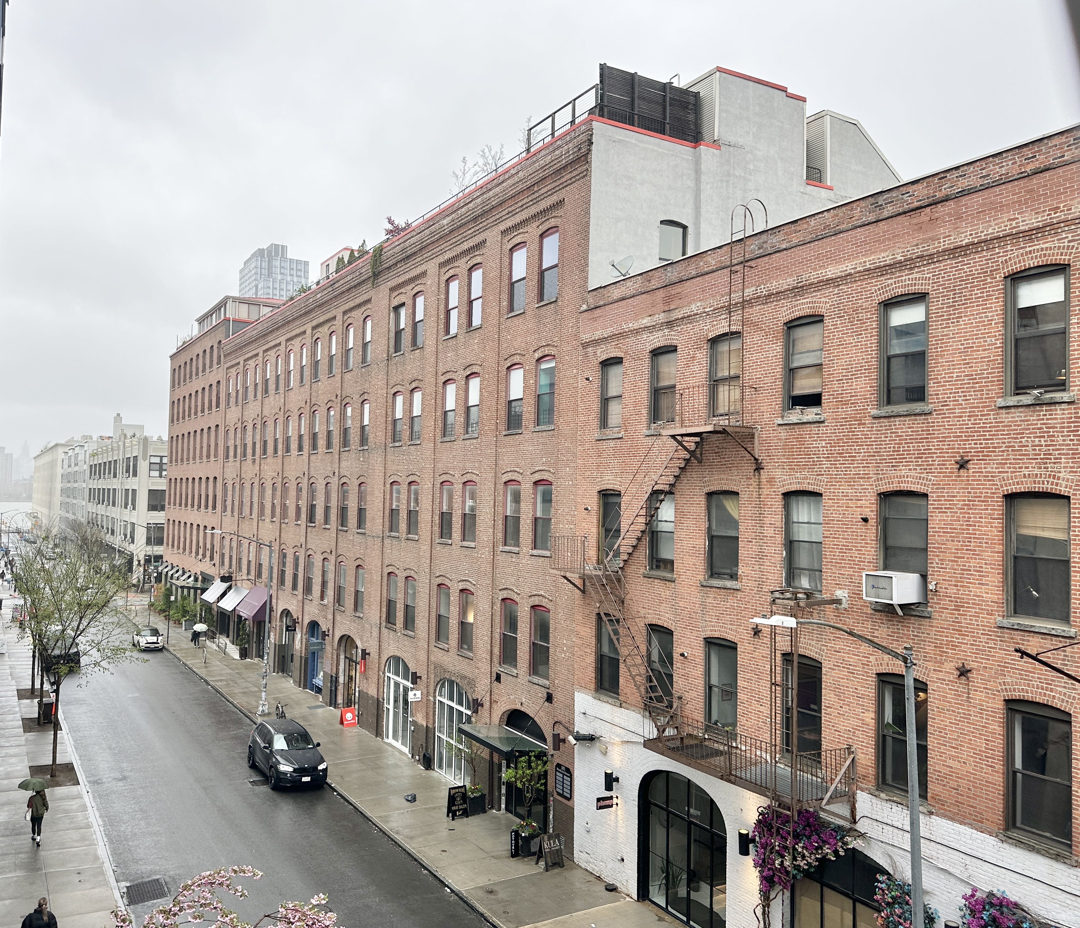 100 North 3rd Street, Unit 3E Brooklyn, NY 11249 - Photo 12 of 15 a large building with a lot of windows