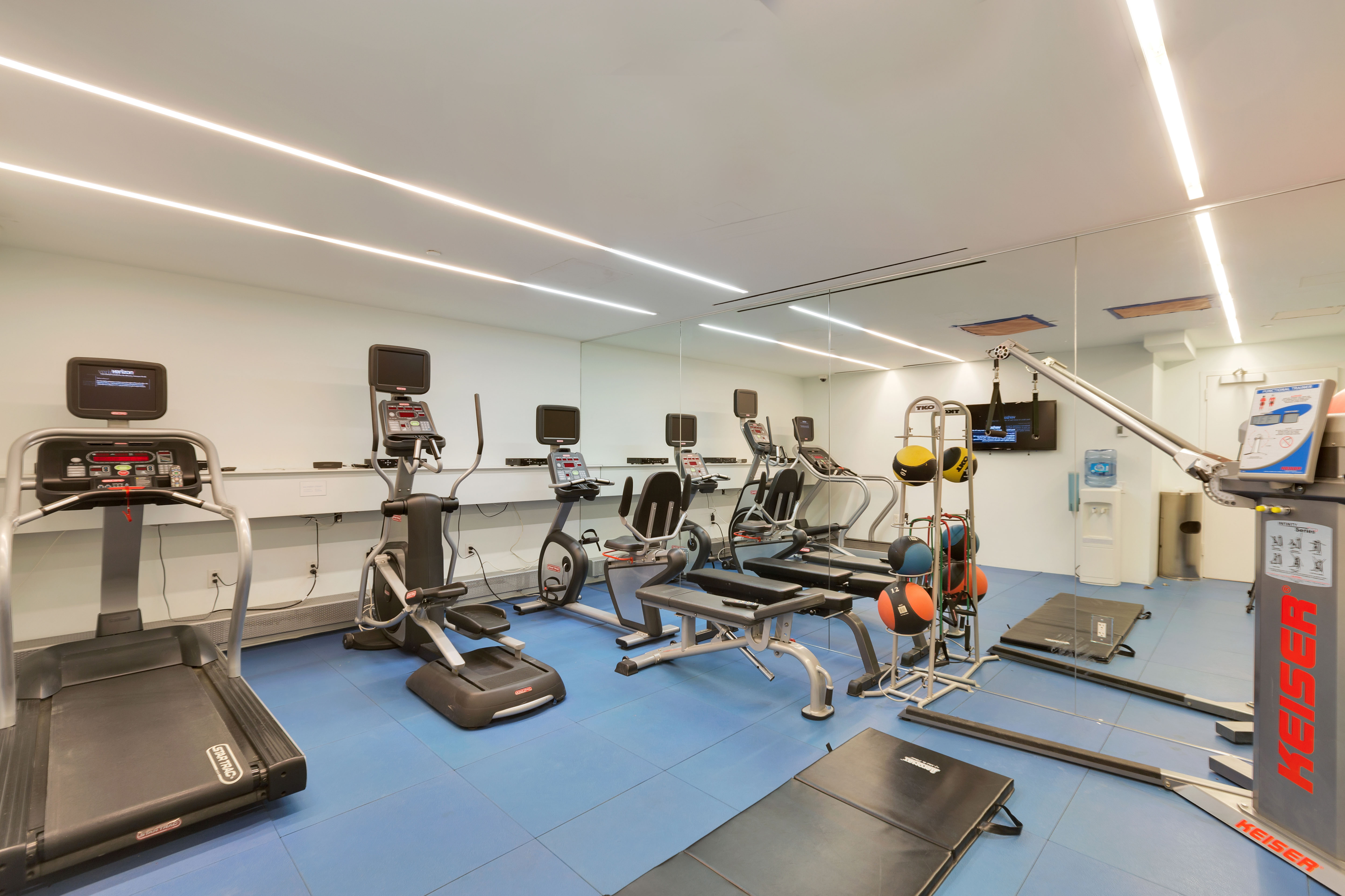 166 Perry Street, Unit 6A Manhattan, NY 10014 - Photo 19 of 20 a view of a room with gym equipment