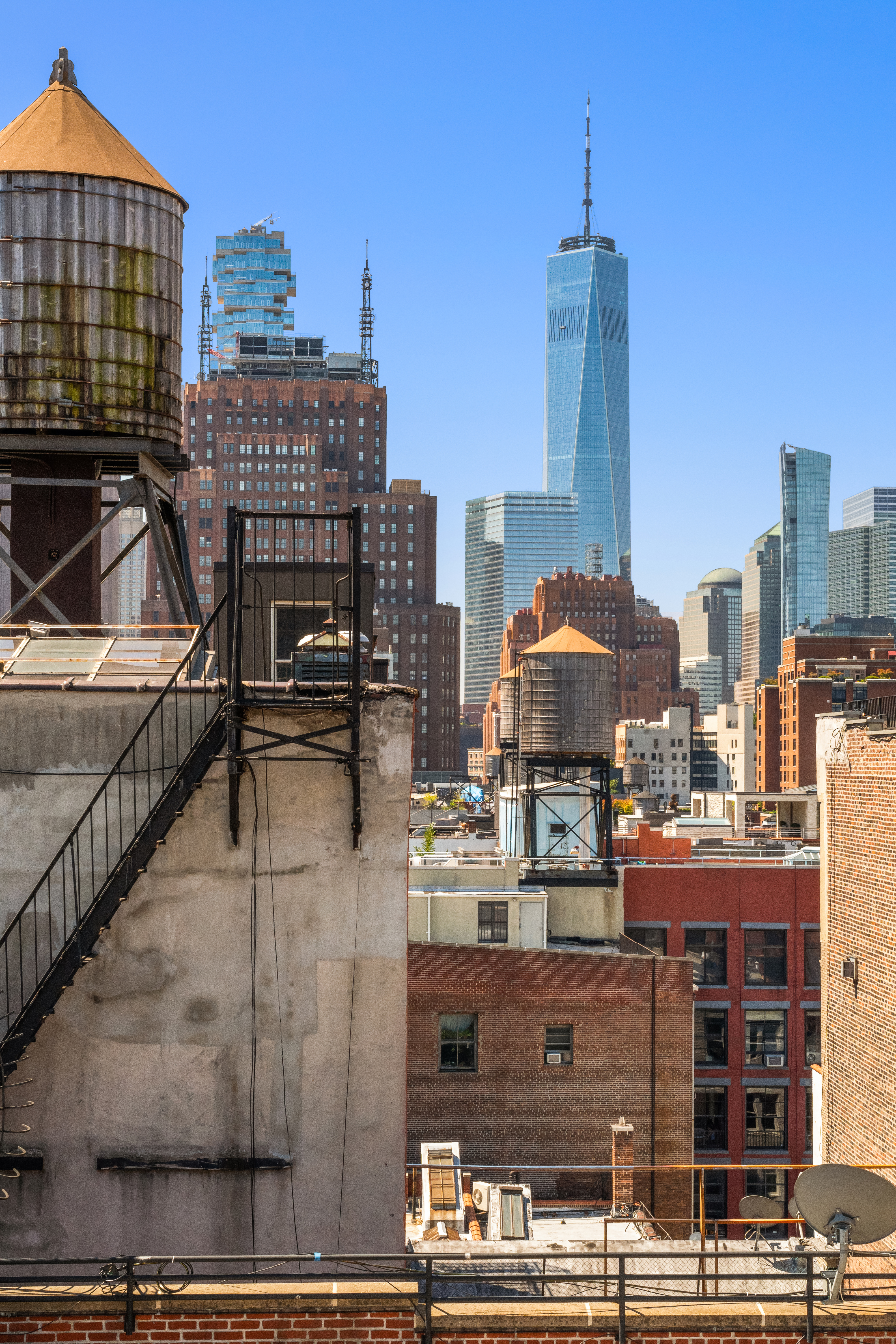 101 Wooster Street, Unit 3/4F Manhattan, NY 10012 - Photo 12 of 16 a view of a city with tall buildings