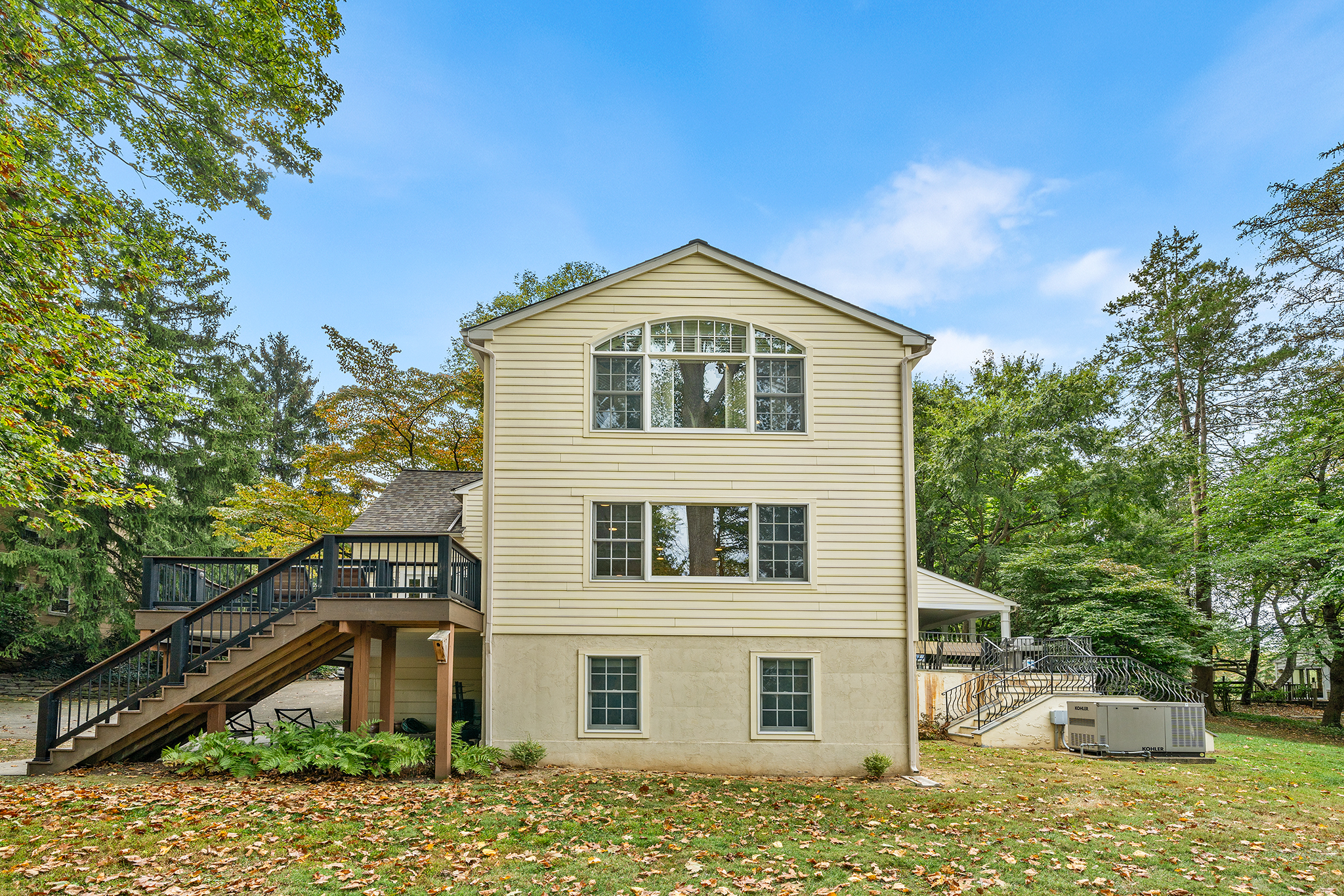 718 Arlington Road Narberth, PA 19072 - Photo 37 of 47 a front view of a house with a yard