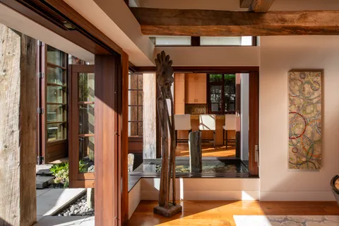 a outdoor space with patio the couches and pool under an umbrella