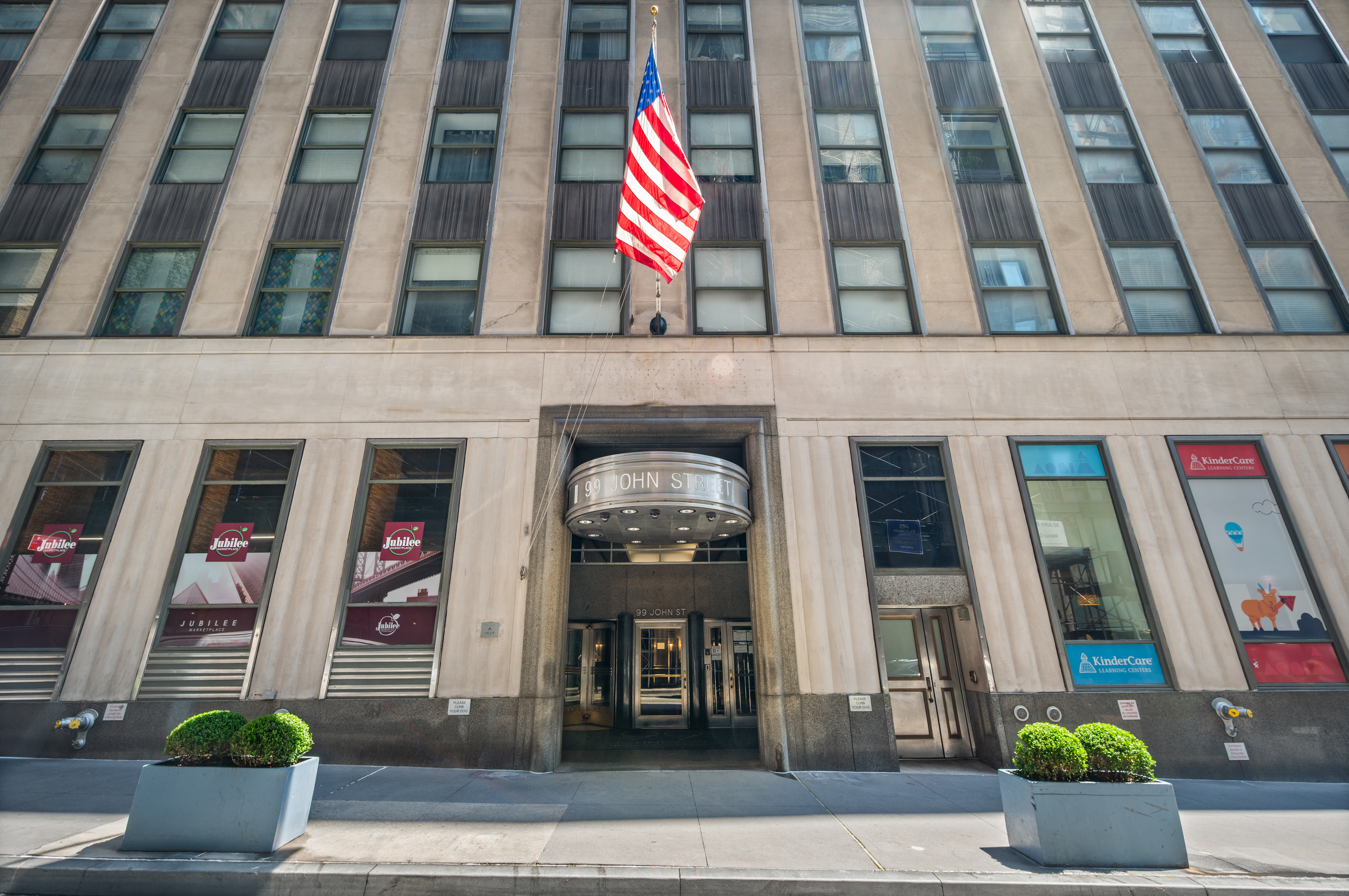 99 John Street, Unit 920 Manhattan, NY 10038 - Photo 16 of 18 a front view of a building