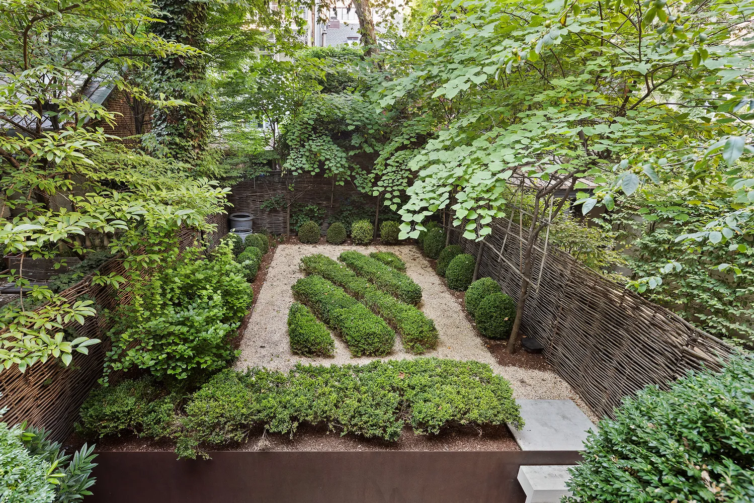 a view of statue in a garden