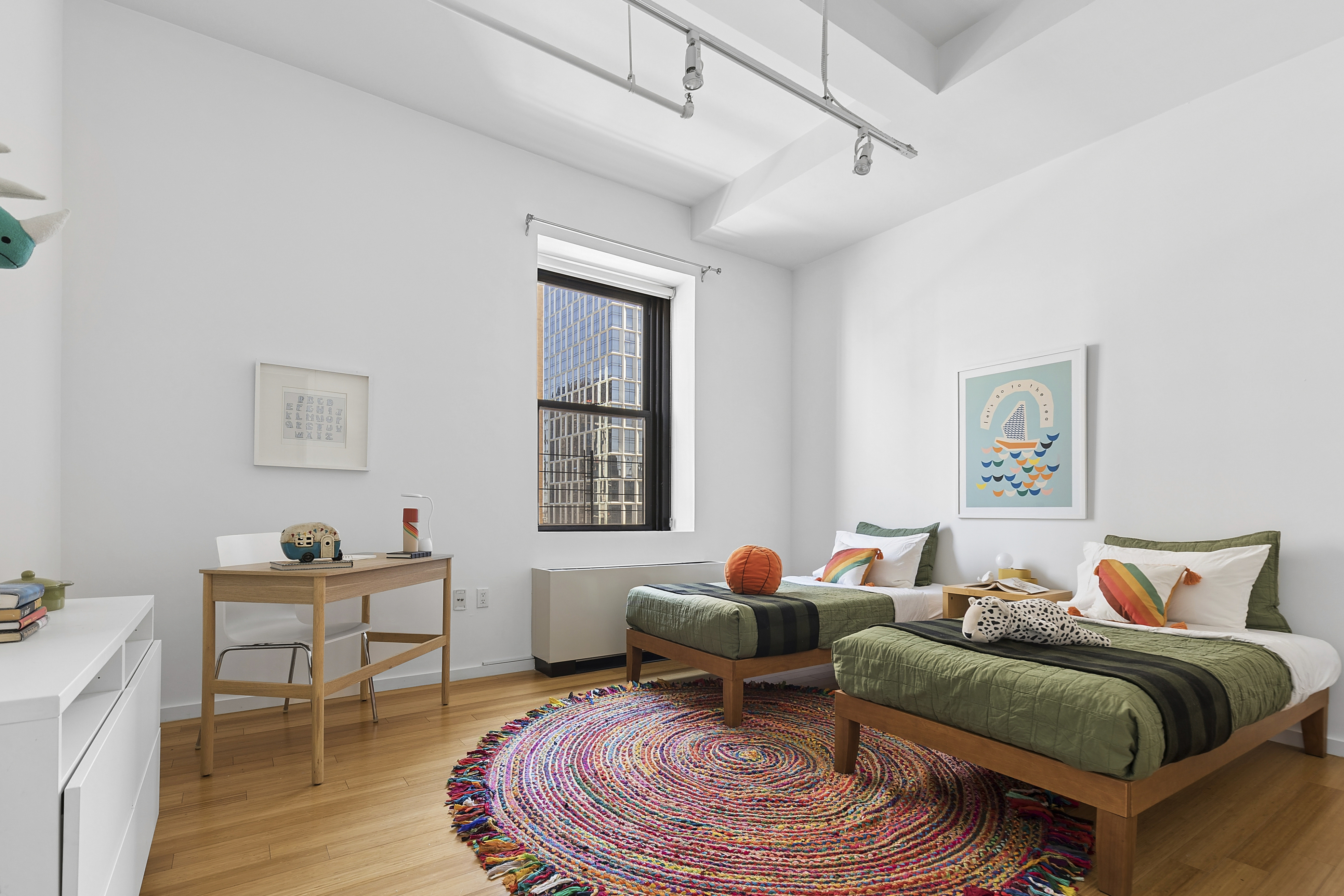 365 Bridge Street, Unit 14L Brooklyn, NY 11201 - Photo 7 of 20 a living room with furniture and a window