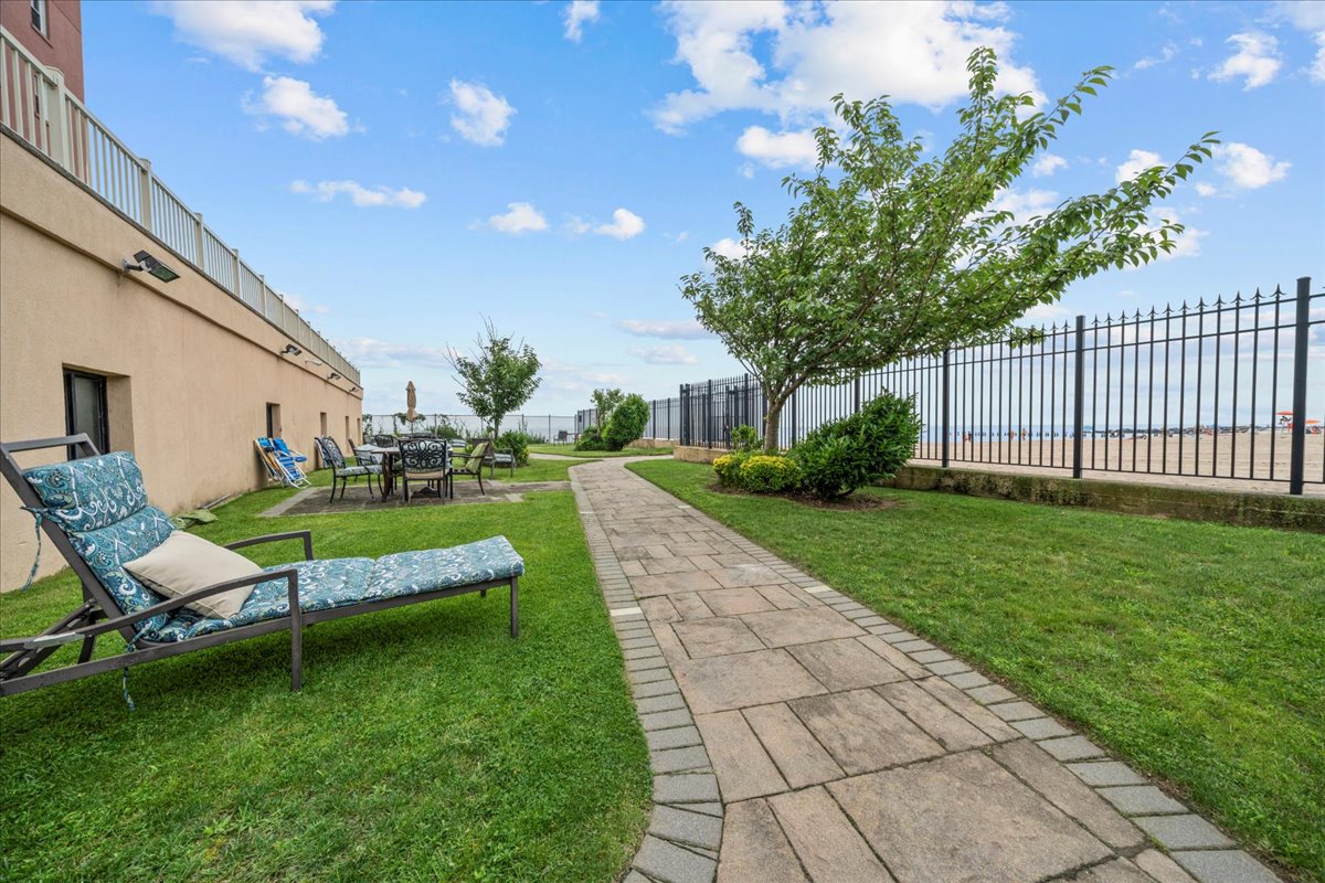 286 Corbin Place, Unit 1D Brooklyn, NY 11235 - Photo 9 of 12 a view of a house with a yard