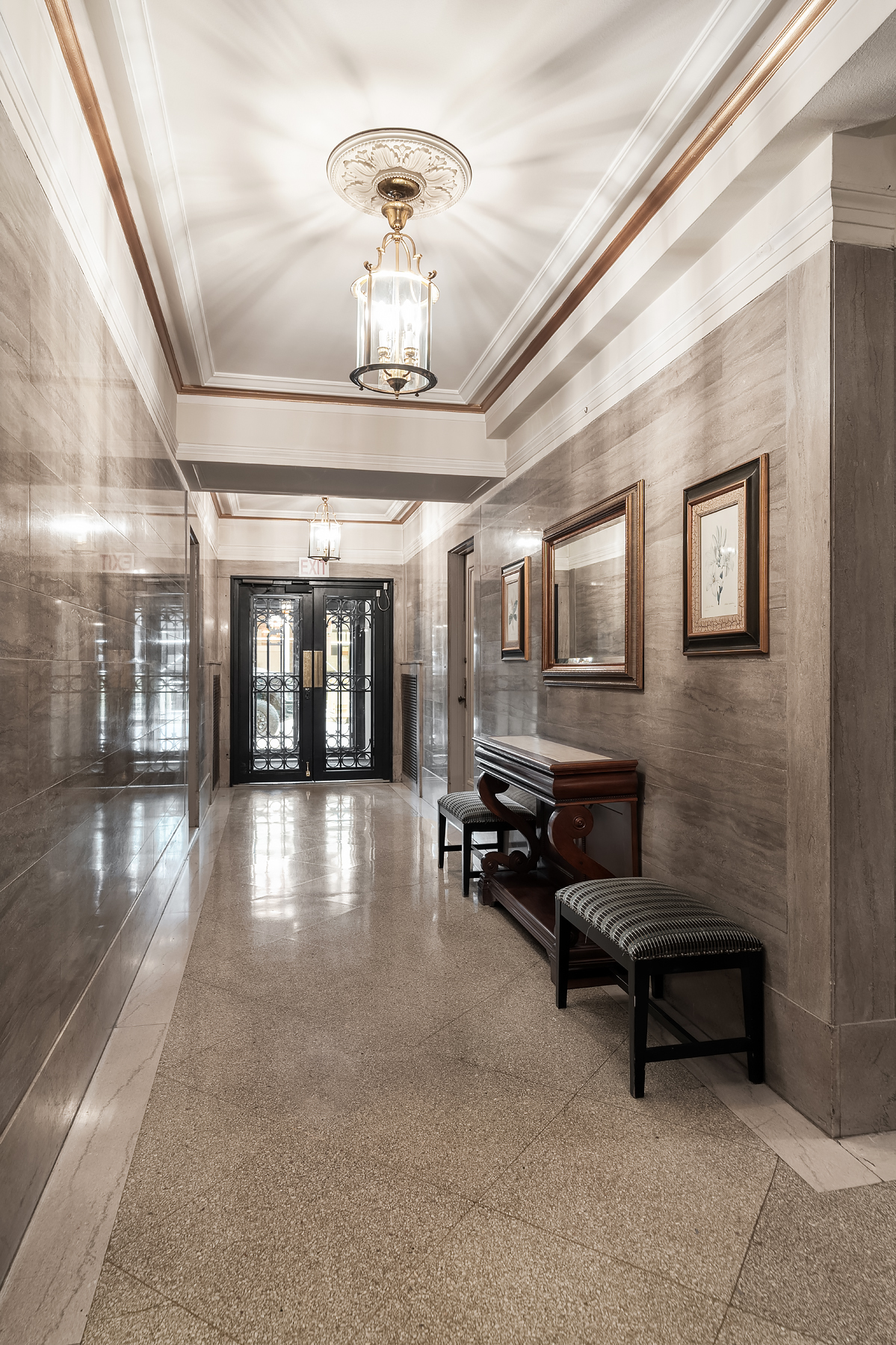 16 East 98th Street, Unit 8D Manhattan, NY 10029 - Photo 10 of 11 a lobby with furniture and window