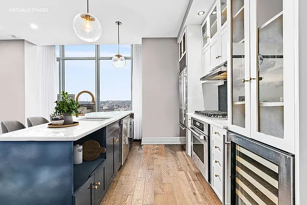 110 Livingston Street, Unit 17K Brooklyn, NY 11201 - Photo 1 of 11 a kitchen with a sink stove and refrigerator