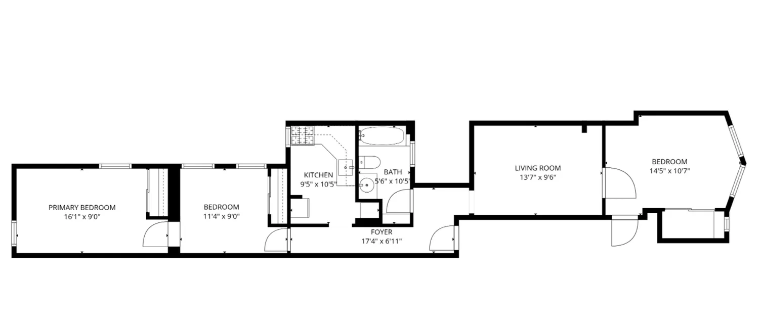 a picture of floor with a white wall and a large window